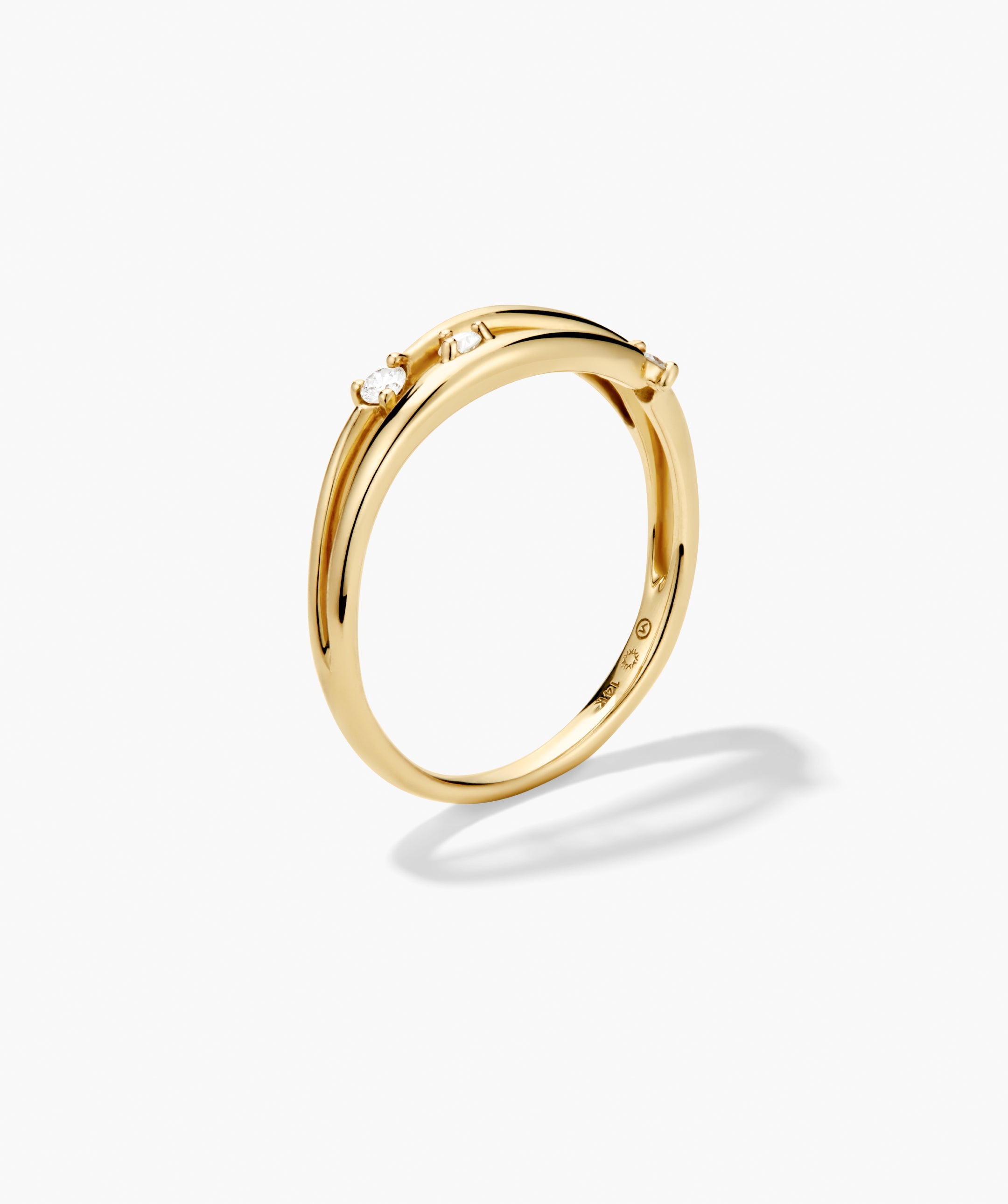 Open DÃ´me Diamond Ring with a slim polished band, set with three round diamonds in 14k responsibly sourced Salmon Gold, showcasing delicate craftsmanship.