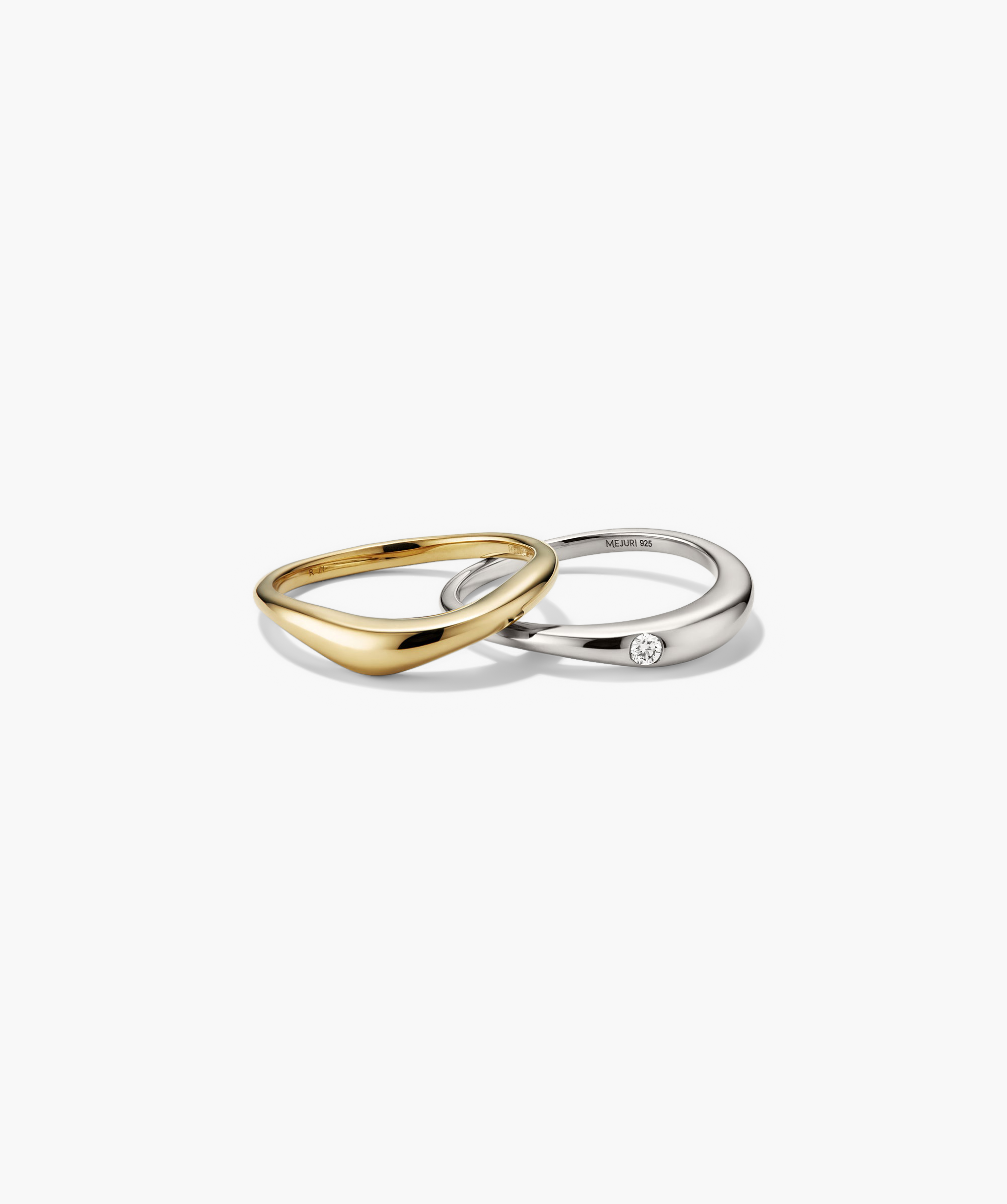 Organic DÃ´me Nesting Ring Set featuring a pair of platinum rings with a diamond, designed to nest perfectly together for a stylish, stacked look.