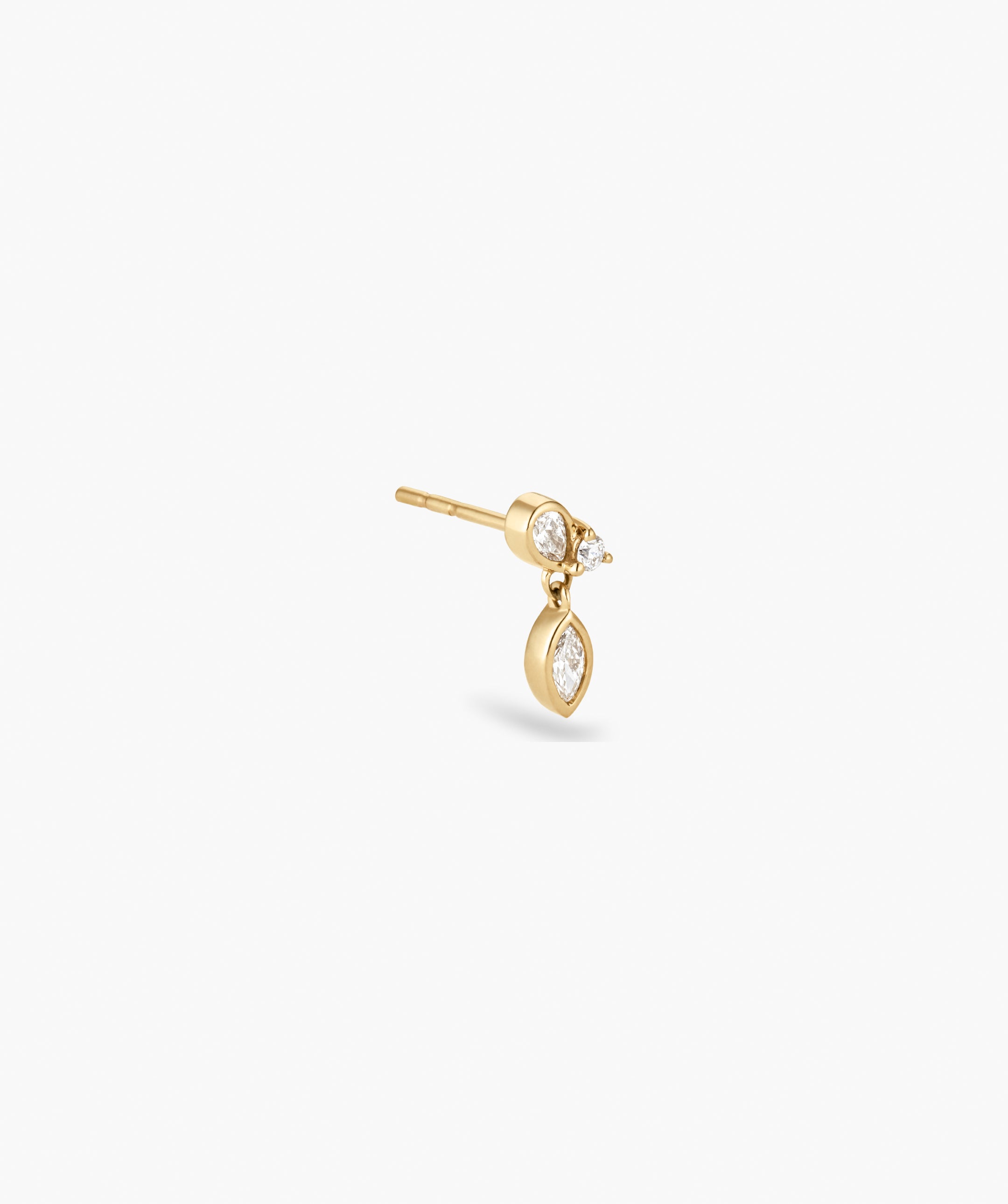 Piercing Studio - Lab Grown Diamond Drop Studs: Yellow-gold studs with two bezel-set diamonds atop and a dangling marquise-cut diamond, offering a subtle, sculptural sway.