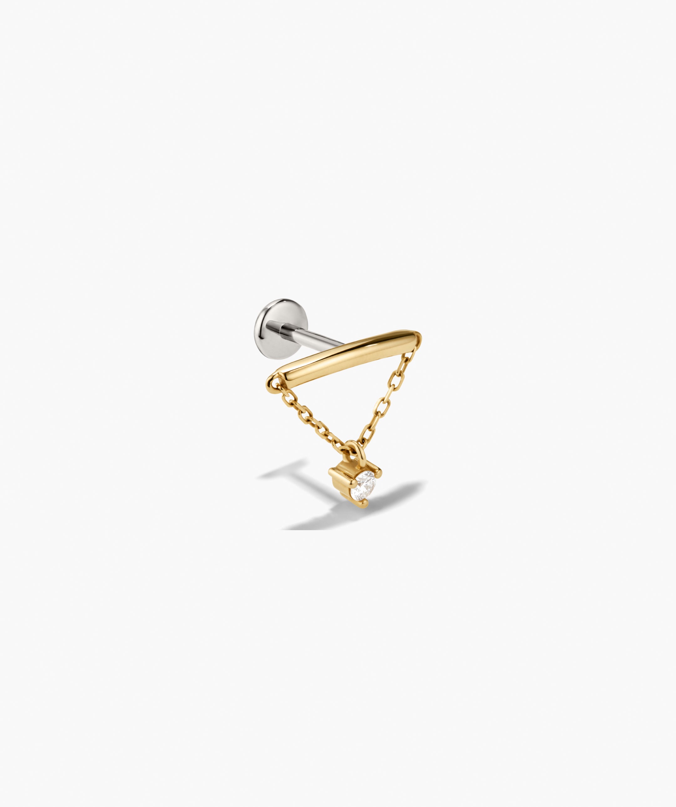 Piercing Studio - Lab Grown Diamond Helix Stud featuring a silvery barbell post, gold tube, delicate gold chain, and a dangling prong-set clear stone.