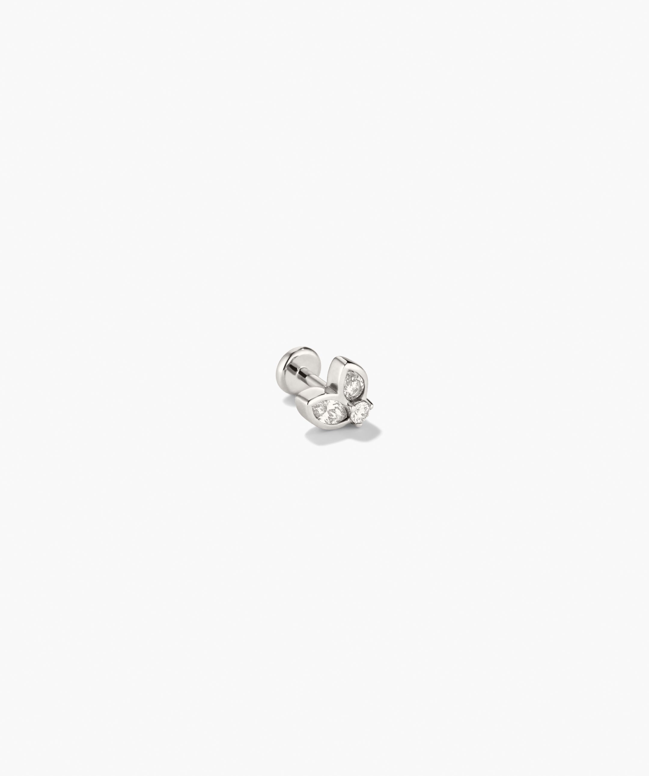 Piercing Studio - Lab Grown Diamond Petal Stud: Silver-tone stud with three clear stones forming a butterfly-like cluster, featuring marquise and round shapes.
