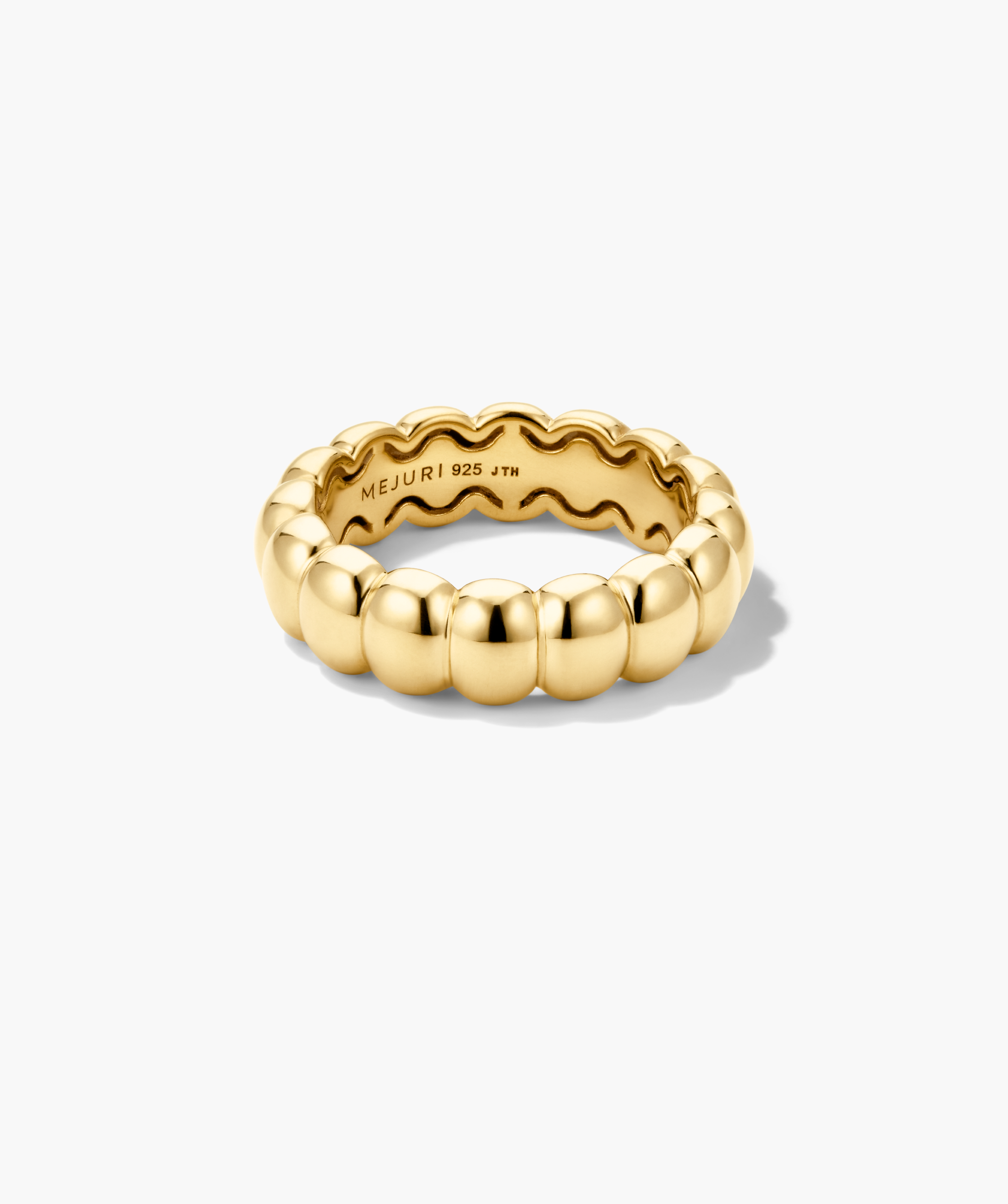 Classic Charlotte Stacker Bundle: A gold-tone ring with a beaded band design, engraved âMEJURI 925 JTH,â showcasing bold curves and high shine.