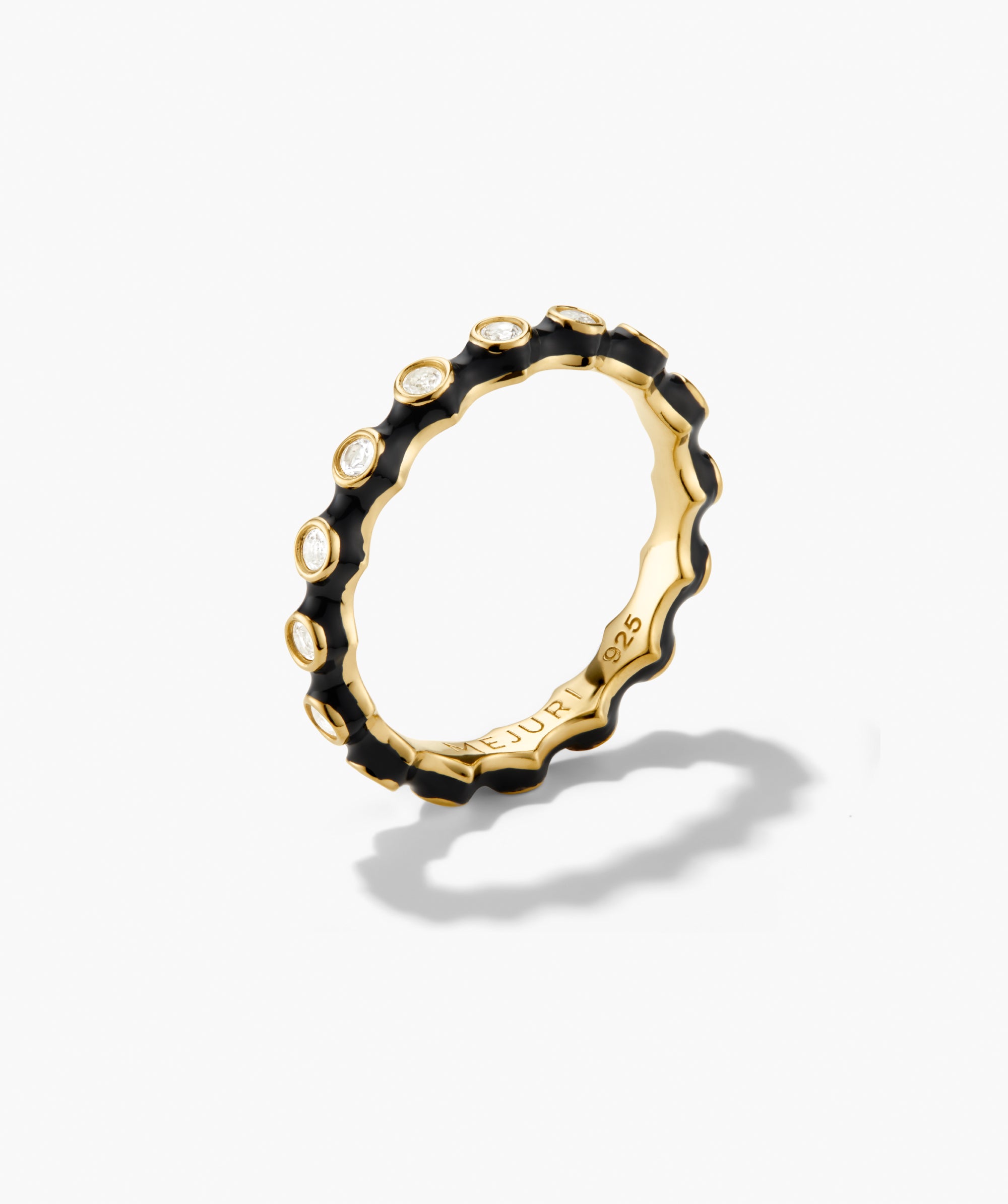 Enamel Charlotte Stacker Ring featuring a wavy-edged yellow-gold plated band with black enamel edges and bezel-set white stones. Perfect for stacking.