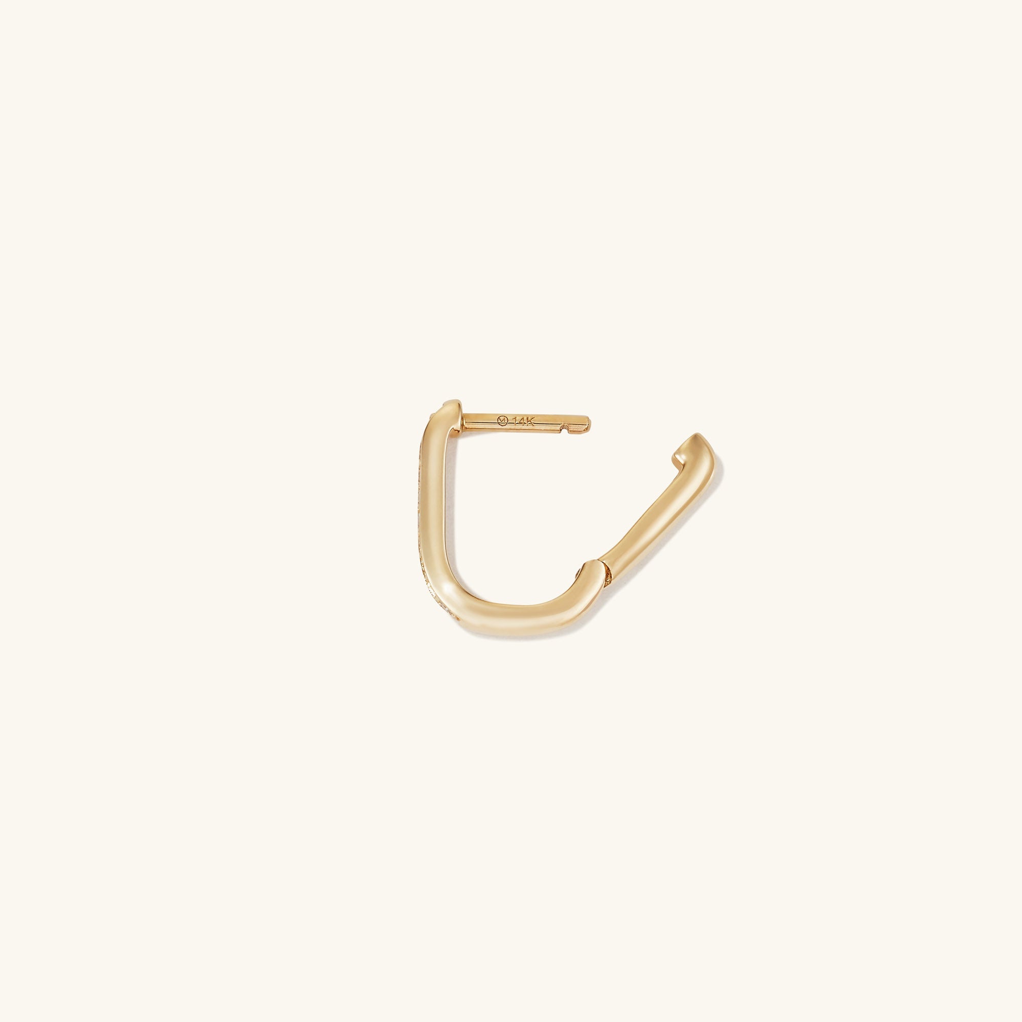 Single PavÃ© Diamond Huggie U Hoop: 14k gold earring with a curved design, adorned with responsibly sourced diamonds for a sparkly ear stack addition.