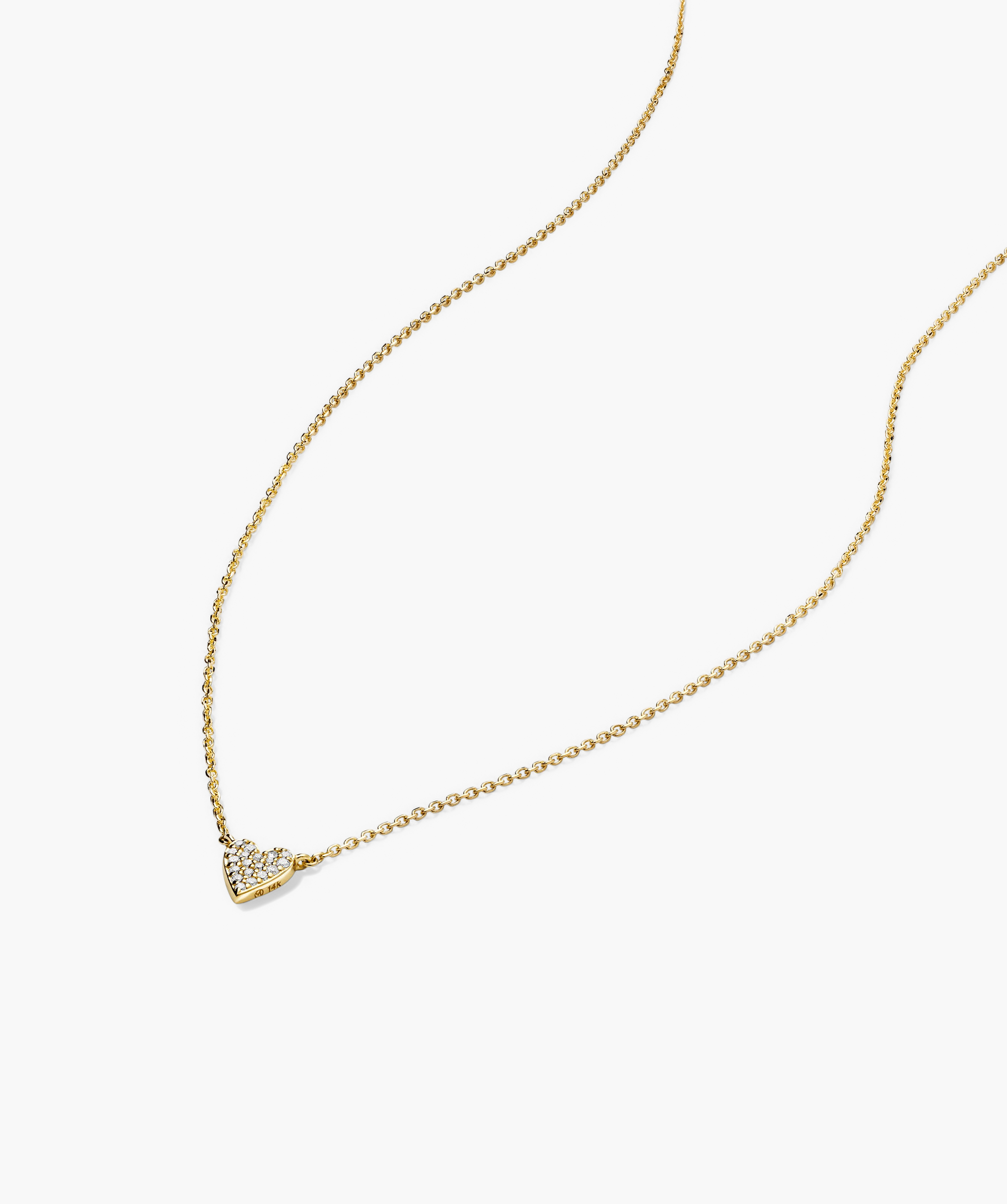 Mini Heart PavÃ© Diamond Necklace featuring a gold chain and heart-shaped pendant adorned with diamonds.