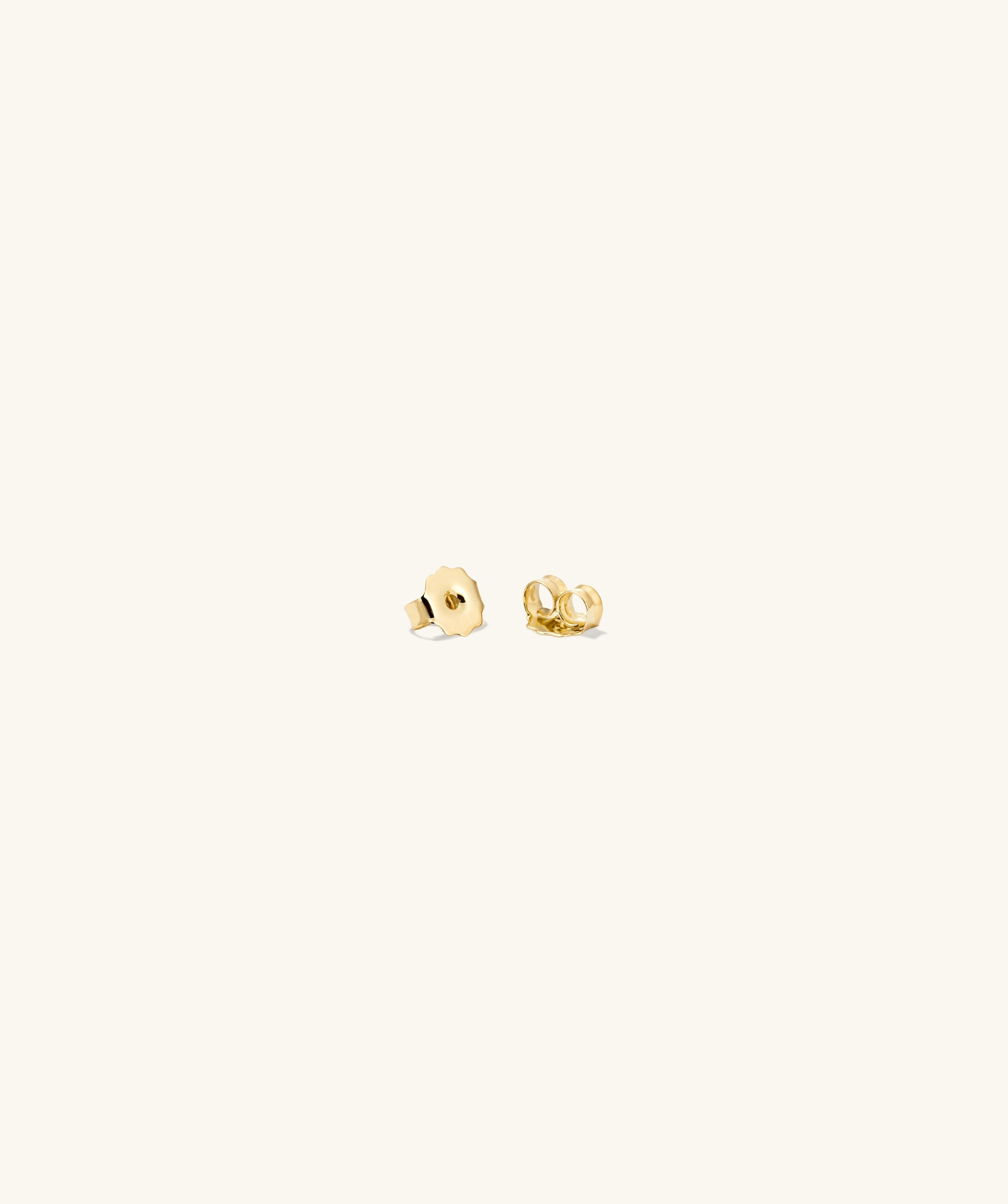 Mini Heart PavÃ© Diamond Stud Earrings, handcrafted in 14k solid gold, featuring a playful heart design embedded with pavÃ© diamonds.