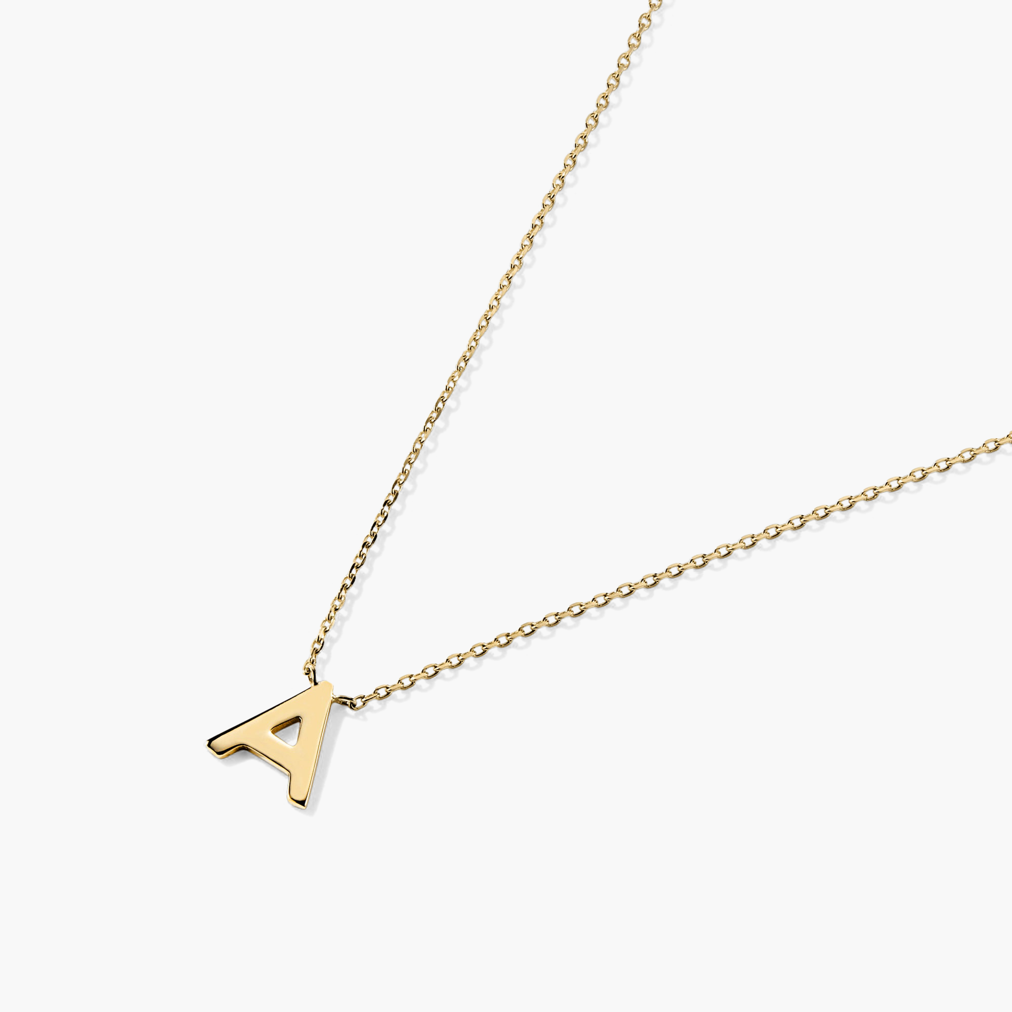 Gold Letter Necklace with a sleek pendant on a fine chain, perfect for personalized style and layering.