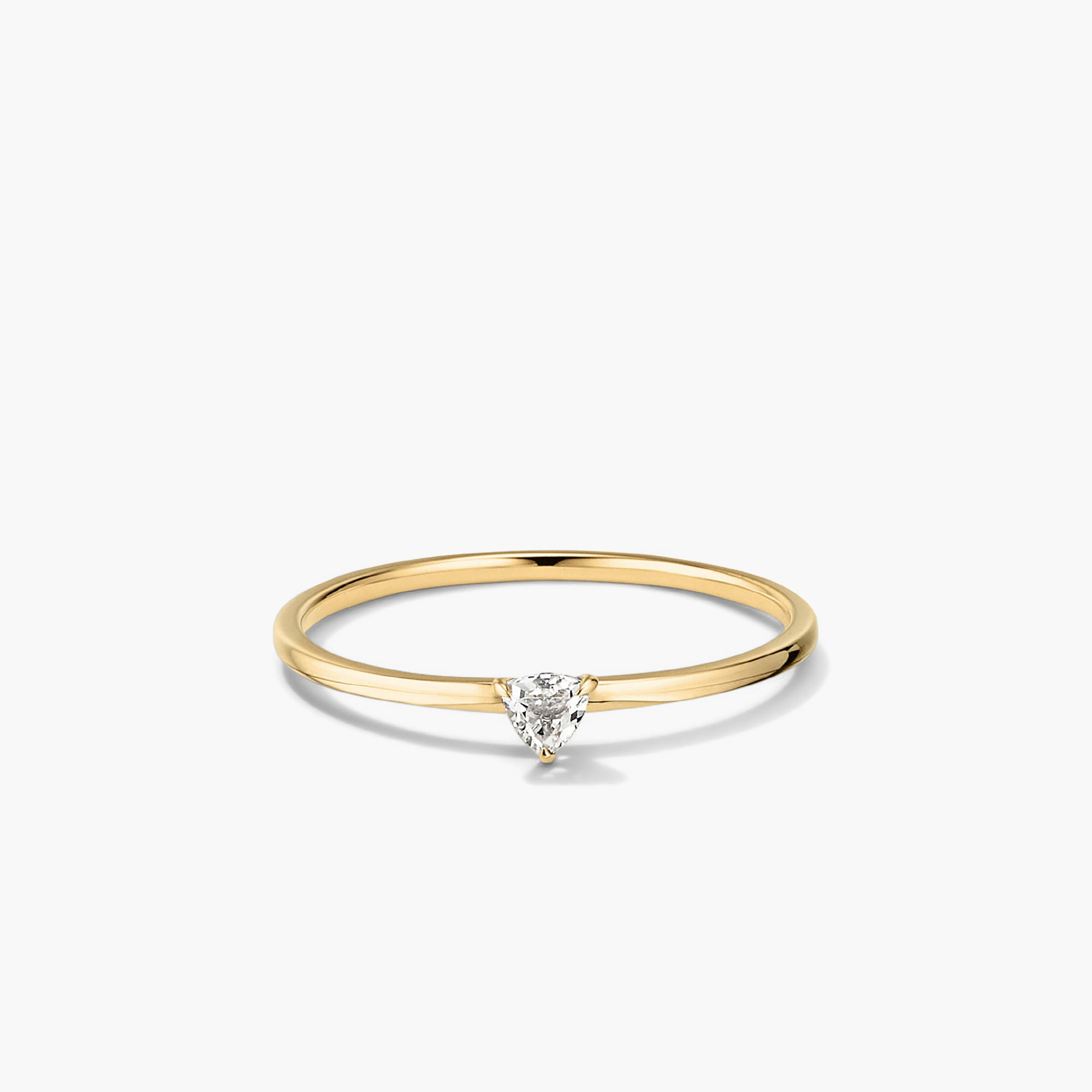 Gemstone Trillion Stacker Ring: a close-up of a handcrafted 14k gold ring with a white topaz gemstone, perfect for stacking.