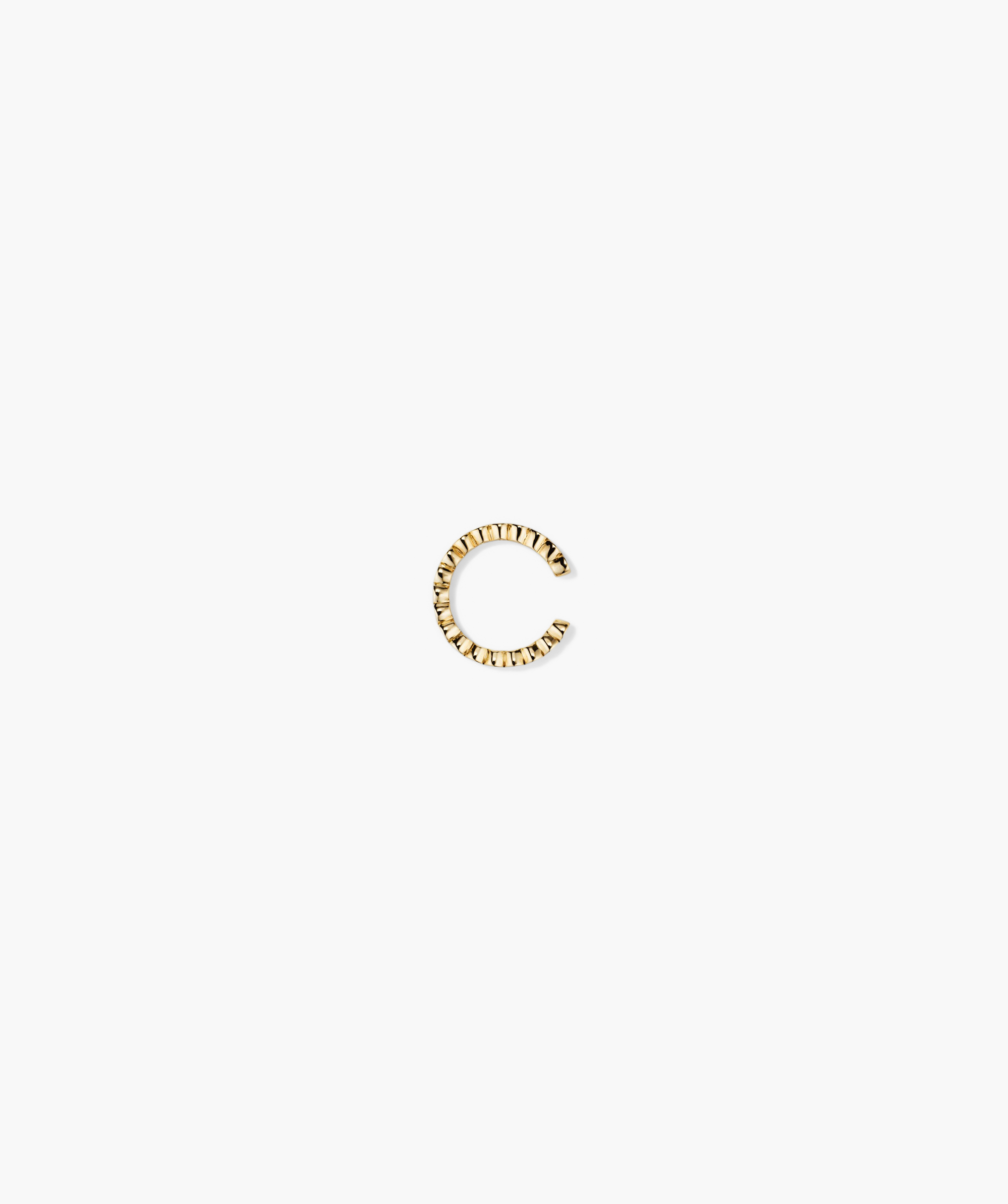 Diamond Ear Cuff showcasing a gold 'C' shape, adorned with responsibly sourced diamonds, designed for easy wear without piercing. Handcrafted in 14k solid gold.