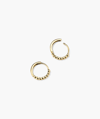 Beaded Huggie Hoops: a pair of handcrafted, beaded earrings in recycled 14k solid gold, ideal for elevating any outfit.