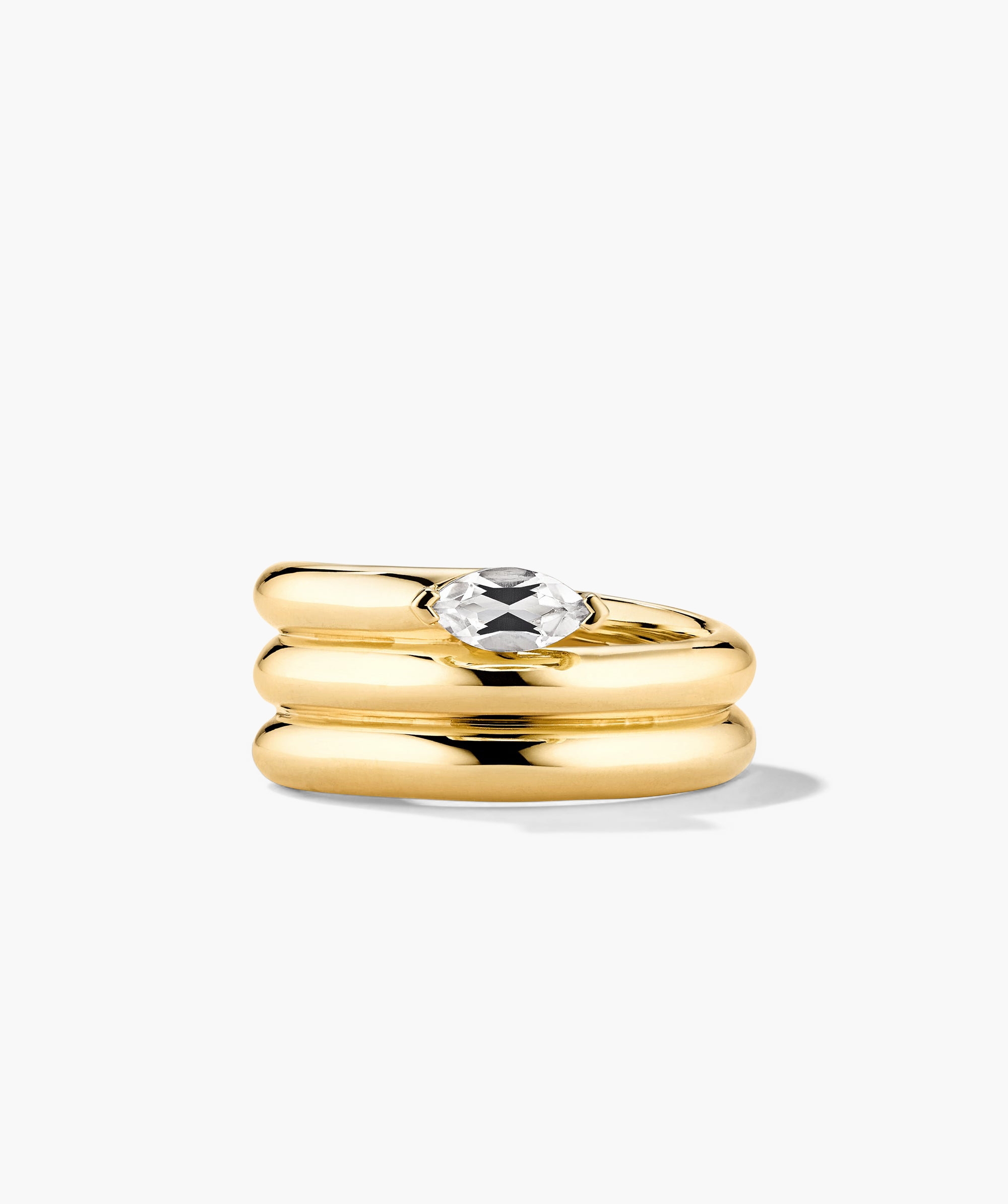 Boa Gemstone Coil Ring: Close-up of a gold ring with a diamond, handcrafted in 18k gold vermeil, showcasing intricate design.