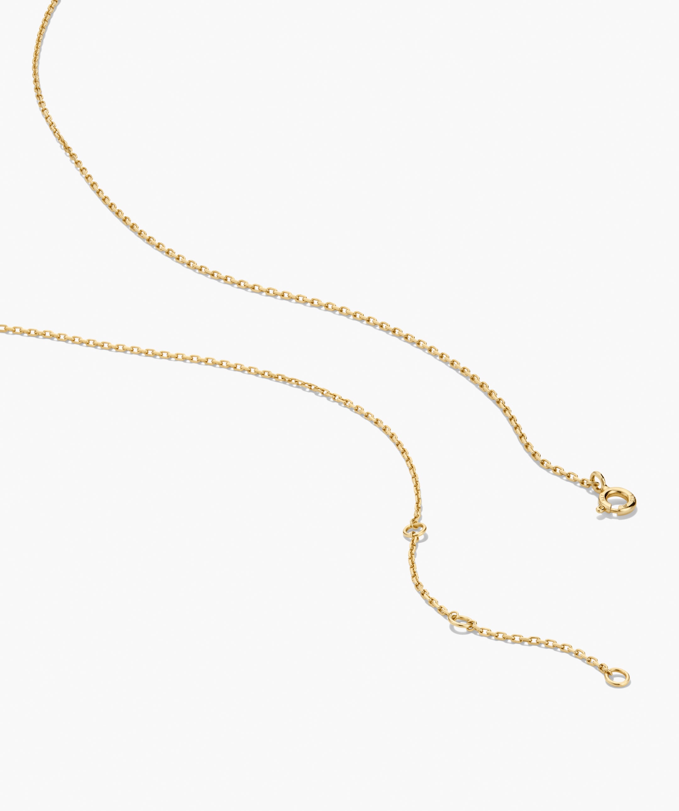 Oval Link Chain Necklace featuring delicate ovular links with a spring-ring clasp and adjustable jump-rings, perfect for adding charms or layering with other pieces.