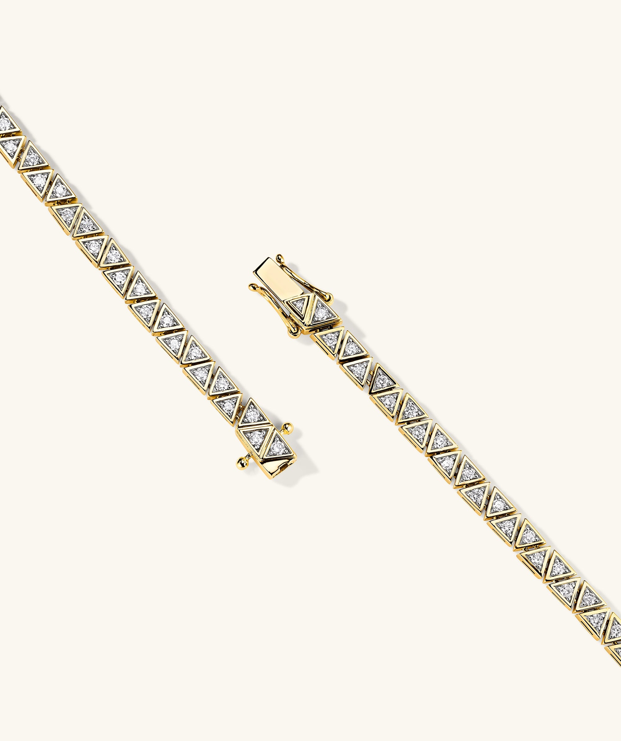 Patra Diamond Tennis Bracelet: A close-up of a handcrafted 14k gold bracelet adorned with responsibly sourced diamonds.