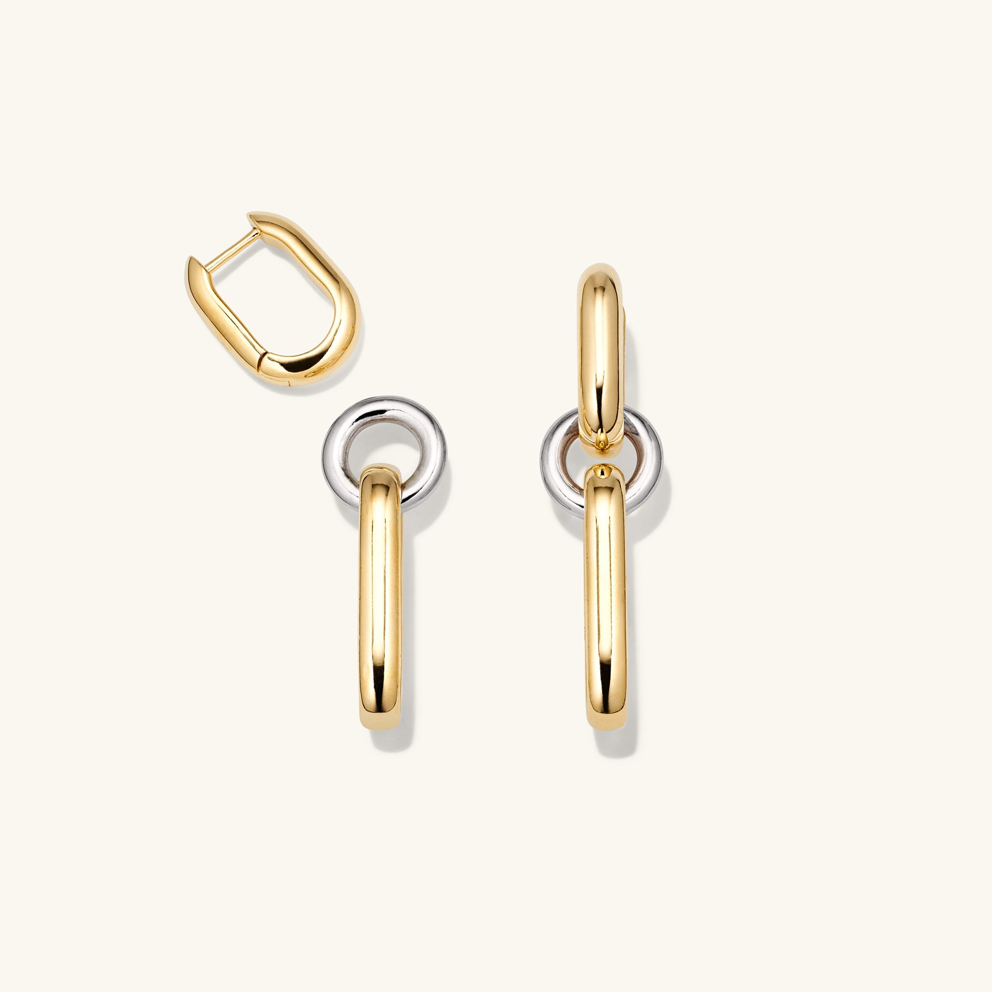 Mixed Convertible Link Earrings: Handcrafted 18k gold vermeil and sterling silver earrings, showcasing dual metal links. Versatile design for wearing as huggies or drop earrings.