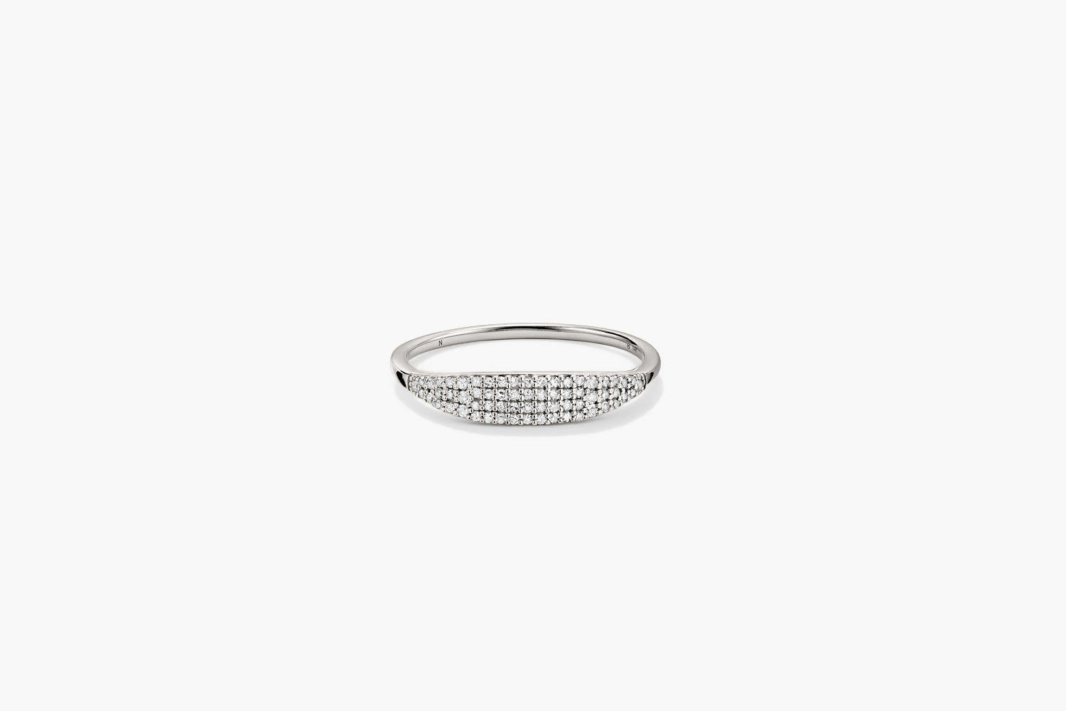PavÃ© Diamond Slim Signet: A sleek silver ring adorned with multiple small diamonds, offering a brilliant low commitment sparkle.
