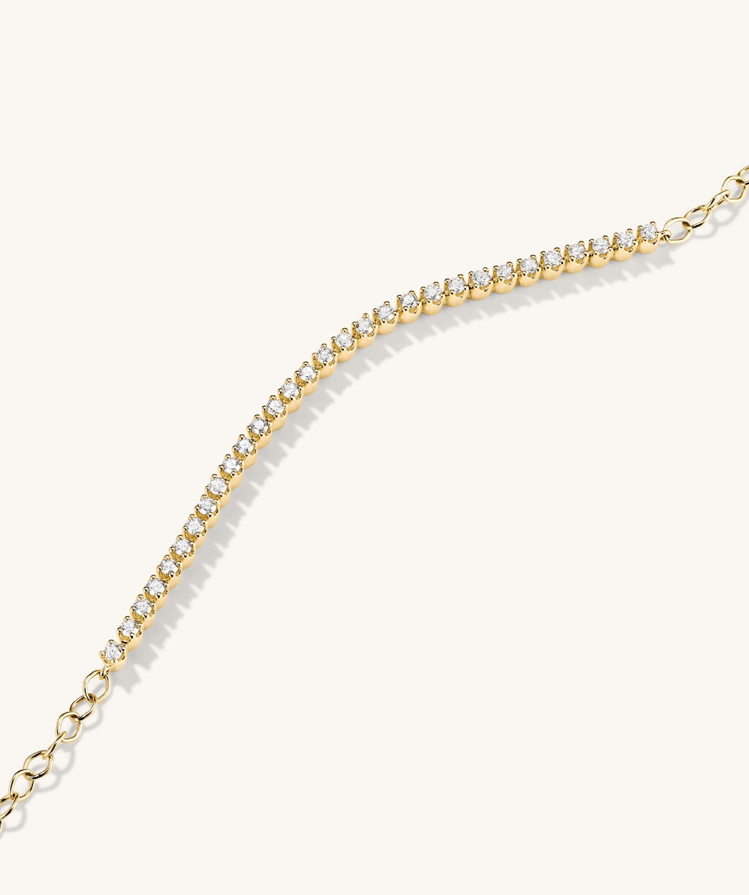 Diamond Half Tennis Bracelet featuring a gold chain with diamonds, showcasing a luxurious, handcrafted design in 14k solid gold with responsibly sourced diamonds.
