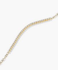 Diamond Half Tennis Bracelet featuring a gold chain with diamonds, showcasing a luxurious, handcrafted design in 14k solid gold with responsibly sourced diamonds.
