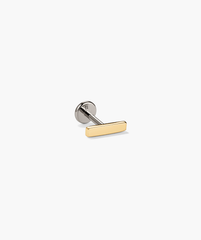 Close-up of Piercing Studio - Bar Flat Back Stud, showcasing its sleek metal design and classic style, perfect for adding elegance to any earring stack.