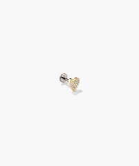 Close-up of the Piercing Studio - PavÃ© Diamond Heart Flat Back Stud, showcasing a heart-shaped design with diamonds, blending gold and silver elements for a playful statement piece.