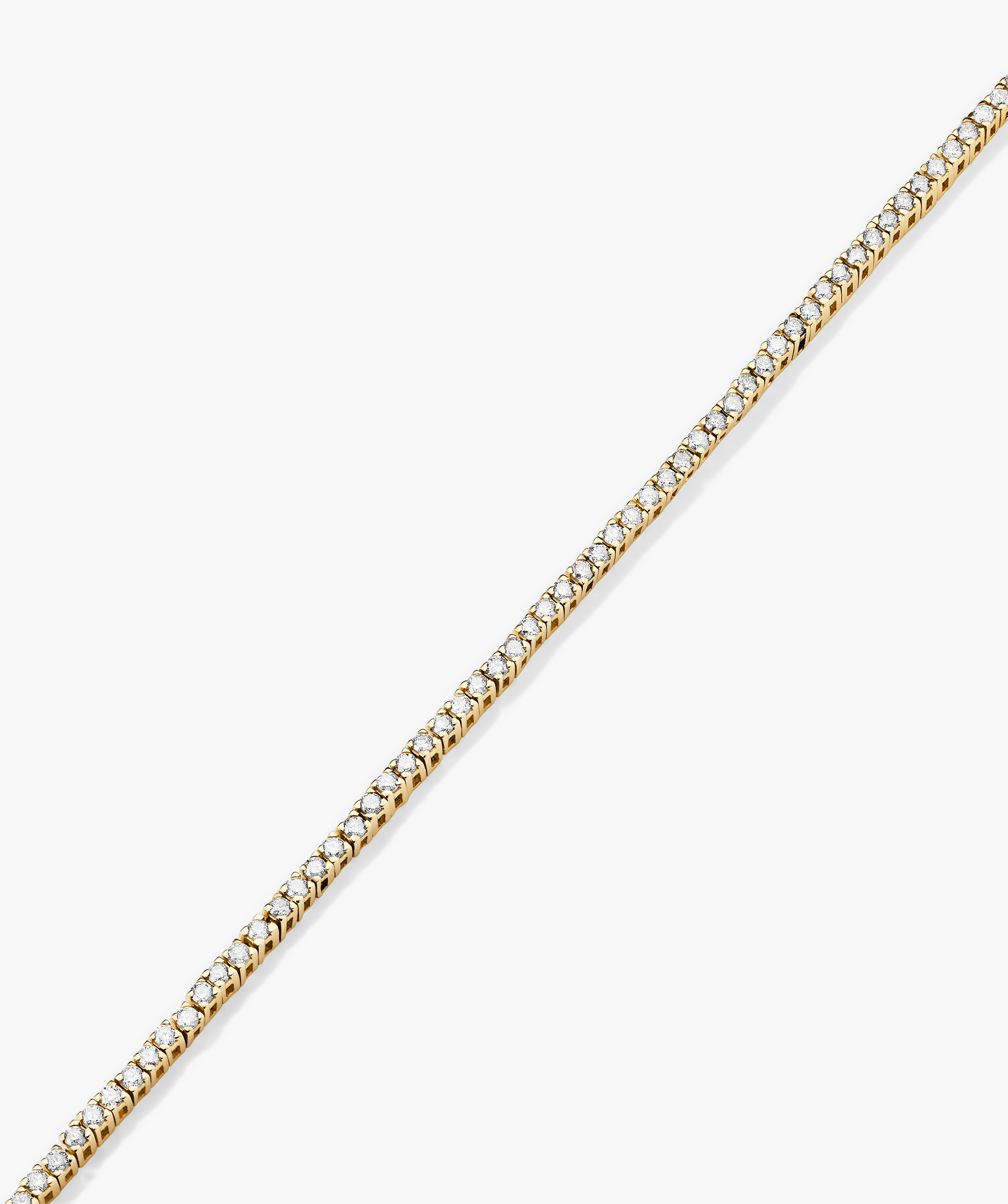 Diamond Tennis Bracelet 1.3mm: Handcrafted 14k gold bracelet featuring a delicate chain adorned with responsibly sourced diamonds, secured by a clasp with safety arms.