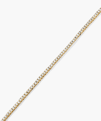 Diamond Tennis Bracelet 1.3mm: Handcrafted 14k gold bracelet featuring a delicate chain adorned with responsibly sourced diamonds, secured by a clasp with safety arms.