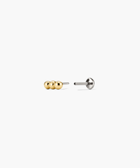 Spheres Bar Stud featuring three gold spheres forming a versatile bar design, ideal for stacking. Comfortable flat back studs with adjustable post sizes for a tailored fit.