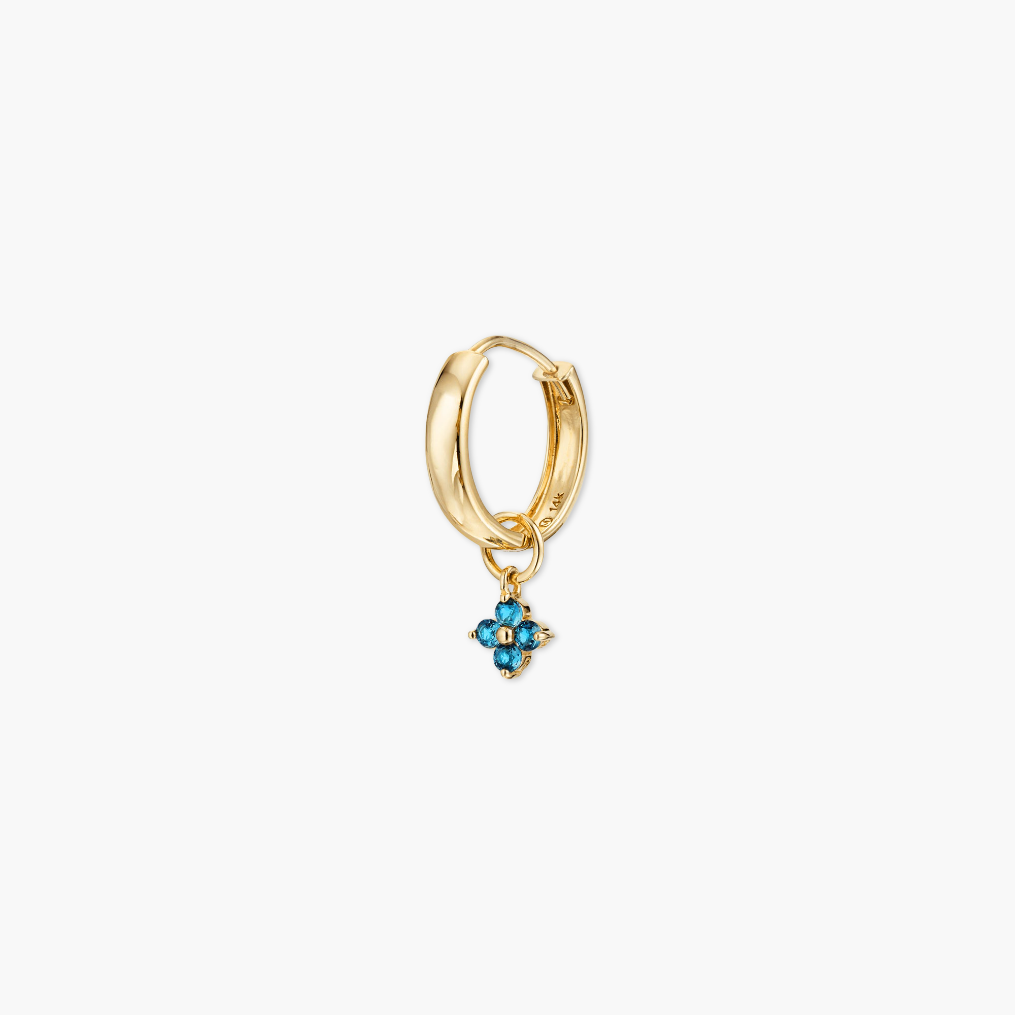 Gold hoop earring featuring a single blue gemstone cluster charm, ideal for personalizing and enhancing your everyday look.