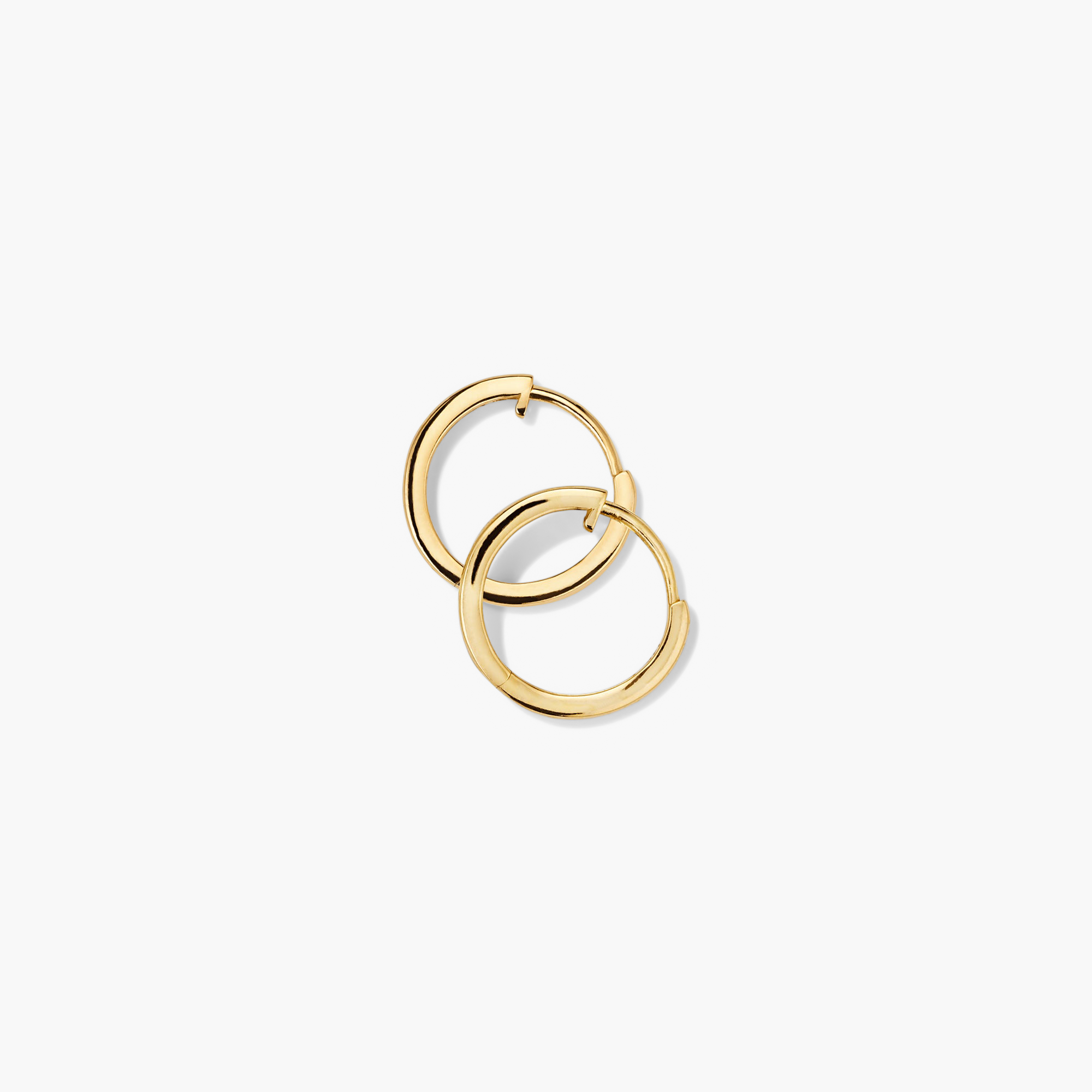 Easy Huggie Hoops: Handcrafted 14k gold hoop earrings with a clicker closure, designed for comfort and everyday wear.