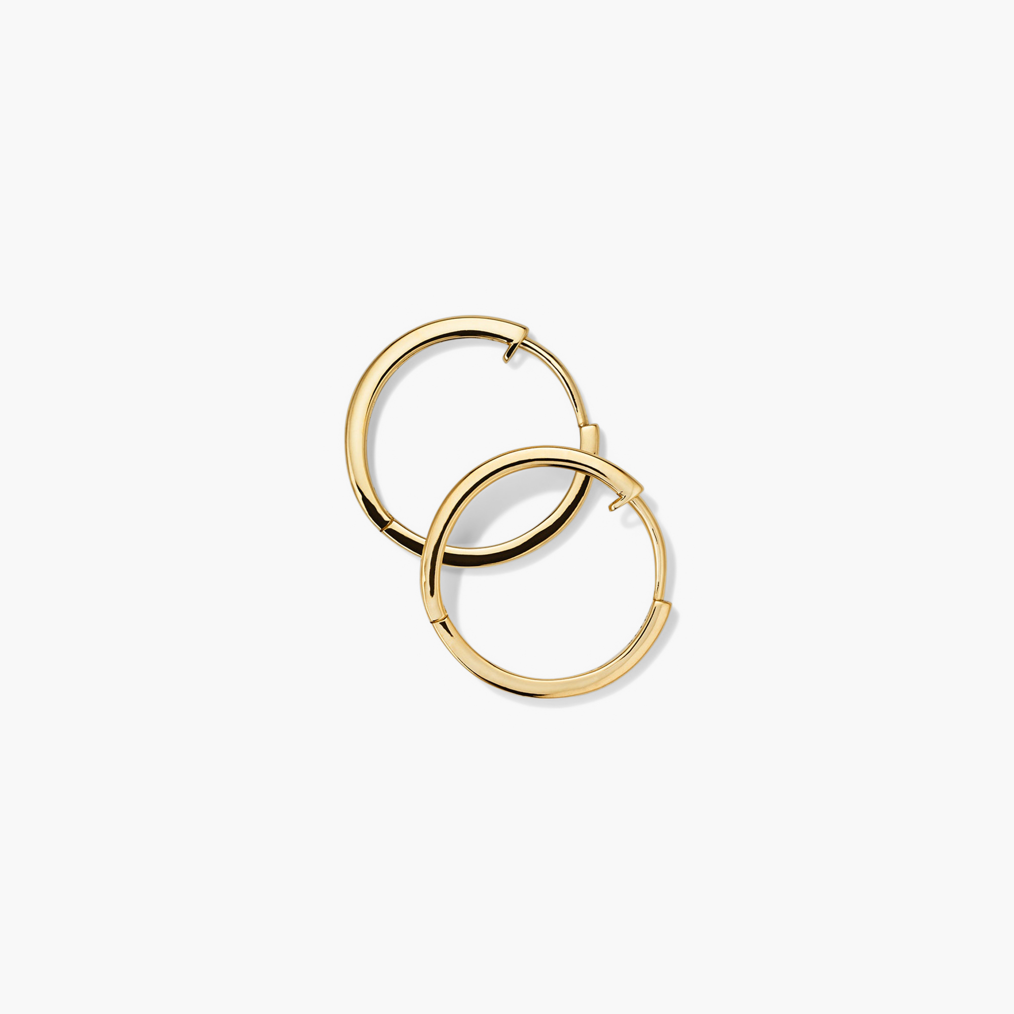 Easy Small Hoops: Handcrafted 14k gold hollow hoop earrings with a clicker closure, designed for everyday comfort and effortless wear.