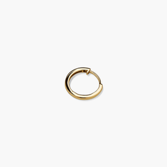 Single Easy Huggie Hoop: A handcrafted 14k gold hoop earring with a clicker closure, designed for comfort and everyday wear.
