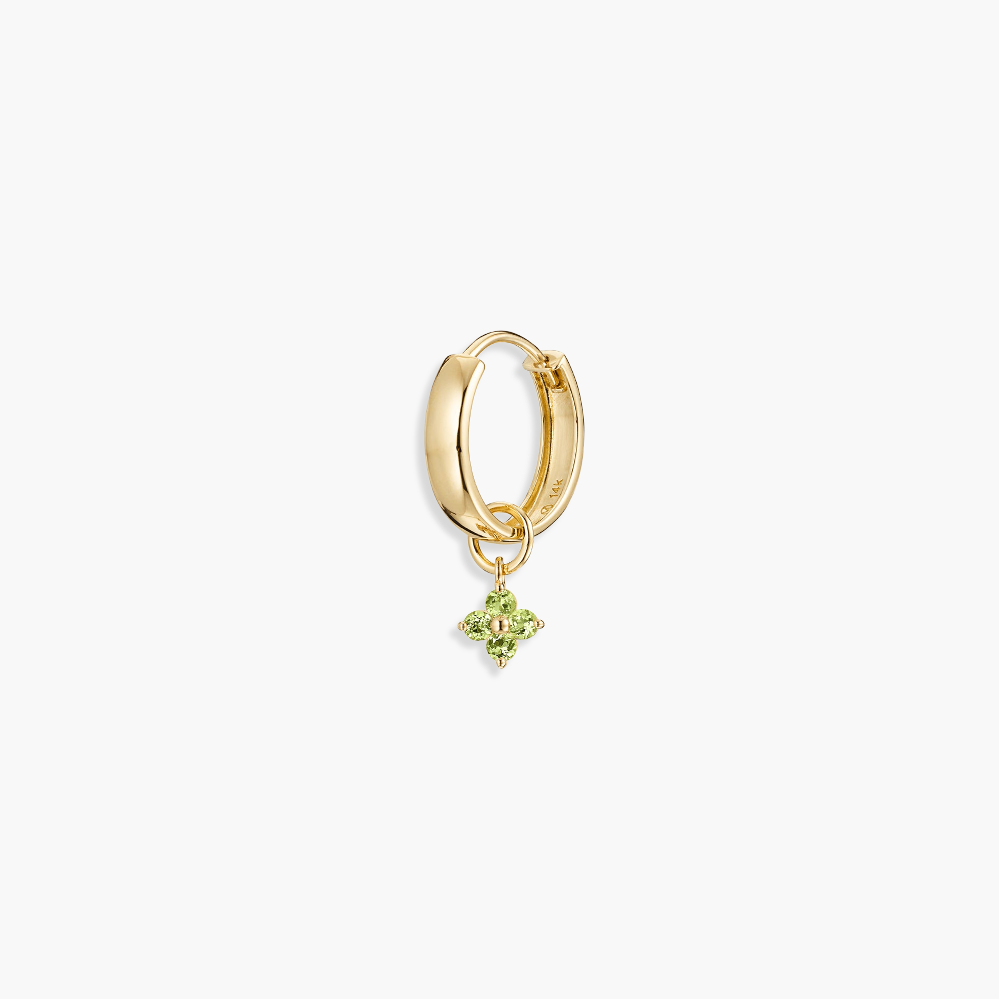 Gold hoop earring with a green gemstone cluster charm, perfect for personalizing your eardrobe.