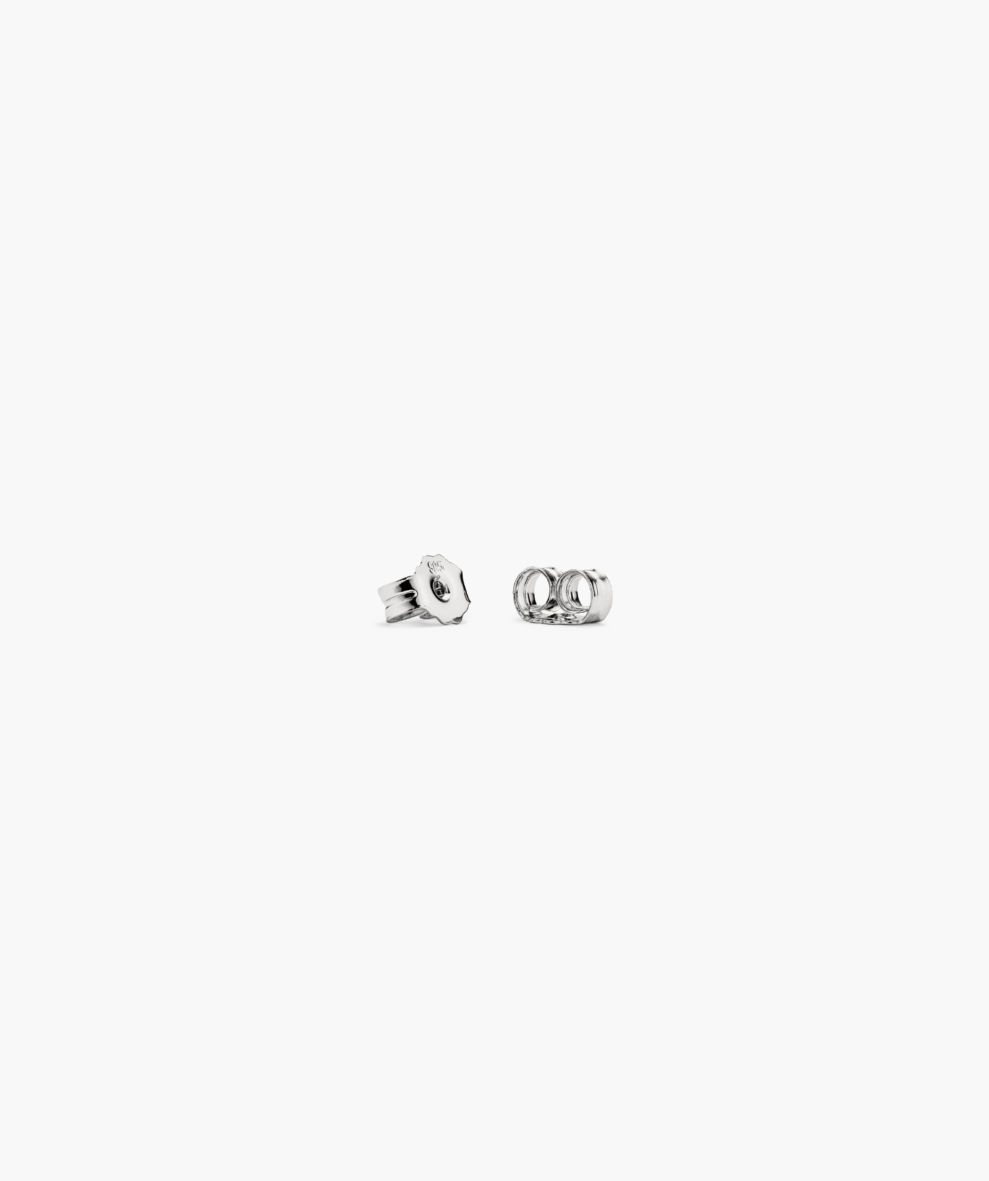 Puffy Charlotte Hoops: A pair of bold, silver earrings with a sleek, rounded design from the Charlotte Collection, emphasizing a statement-making aesthetic.