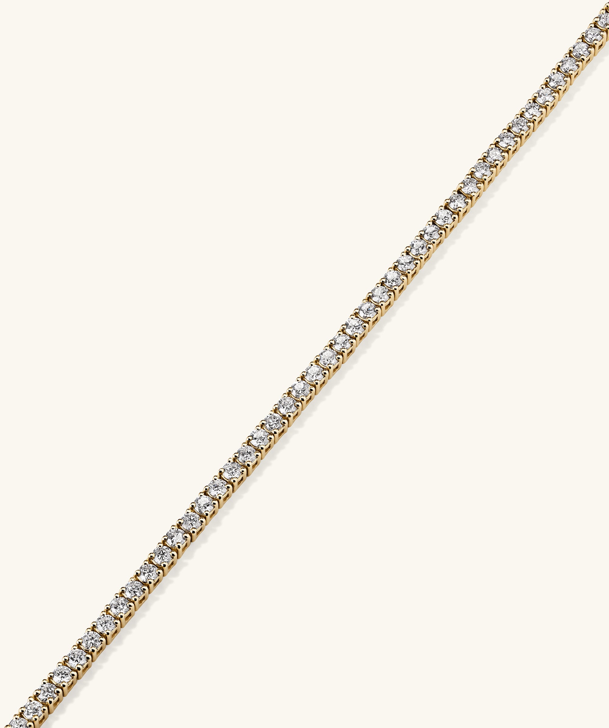 Lab Grown Diamond Tennis Bracelet 1.8mm in 14k gold, featuring lab grown diamonds, with secure clasp mechanism including safety arms and a vertical release button.