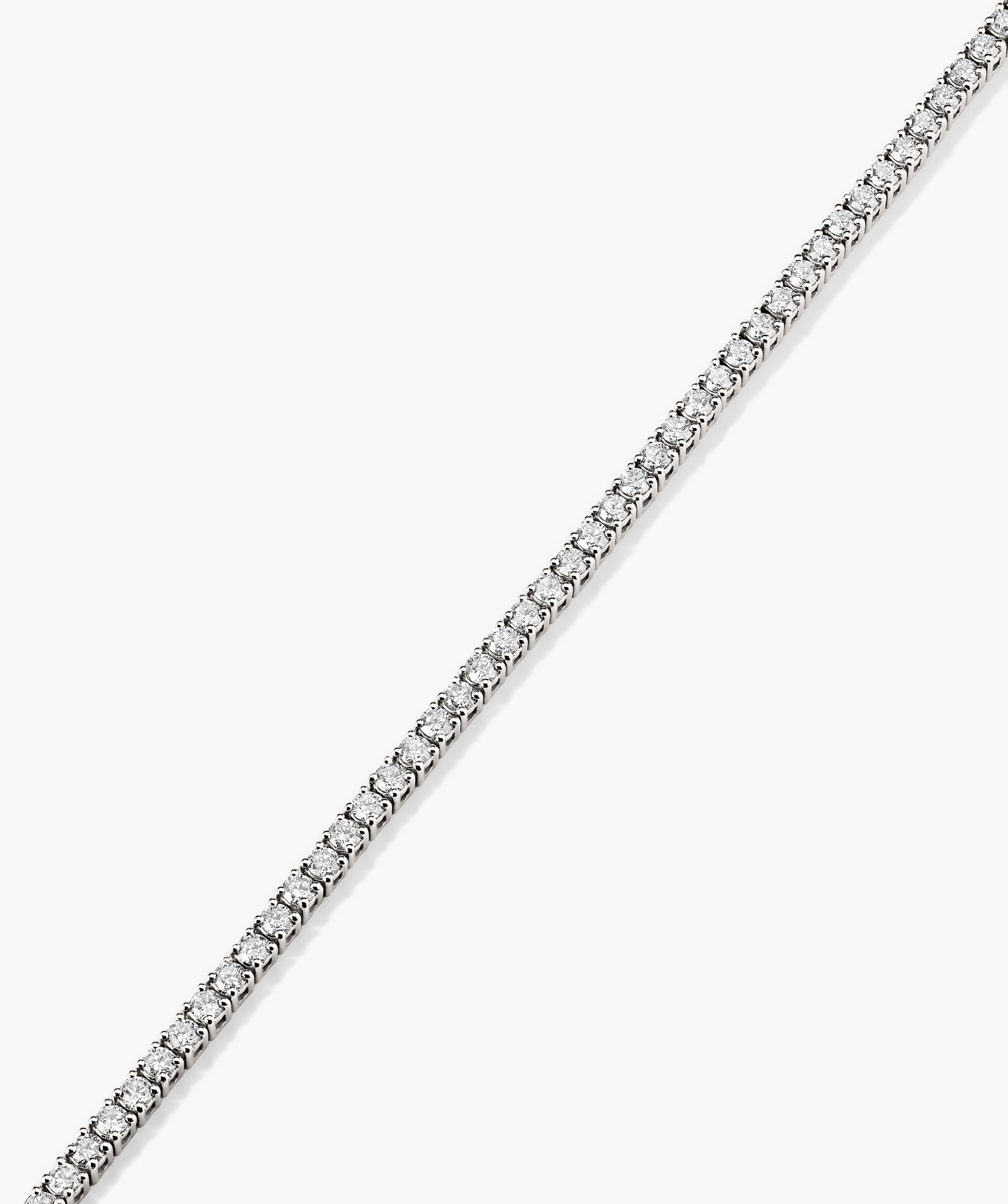 Silver bracelet with lab grown diamonds set in 14k solid gold, featuring a secure clasp with safety arms.