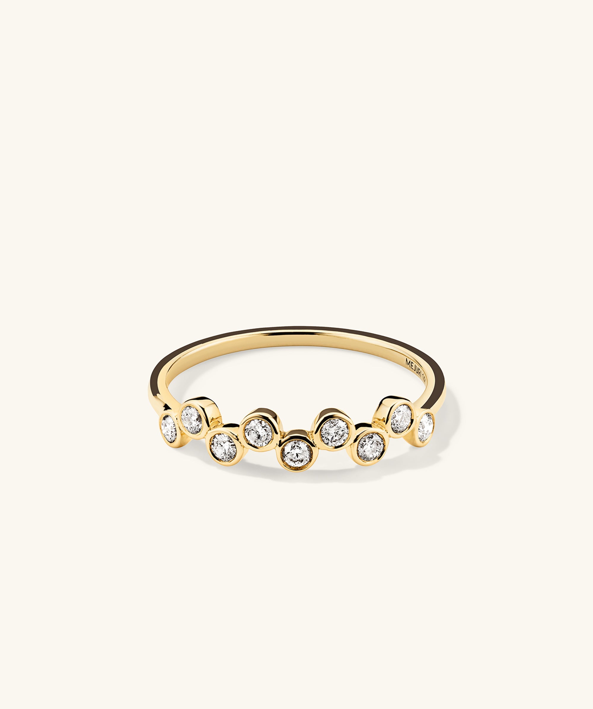 Bezel Lab Grown Diamond Zig-Zag Ring: A 14k gold ring featuring bezel-set lab-grown diamonds in a zig-zag pattern, showcasing ethical, handcrafted elegance.
