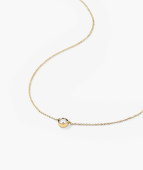 Bezel Lab Grown Diamond Necklace: A 14k solid gold necklace with a central bezel-set lab grown diamond pendant.