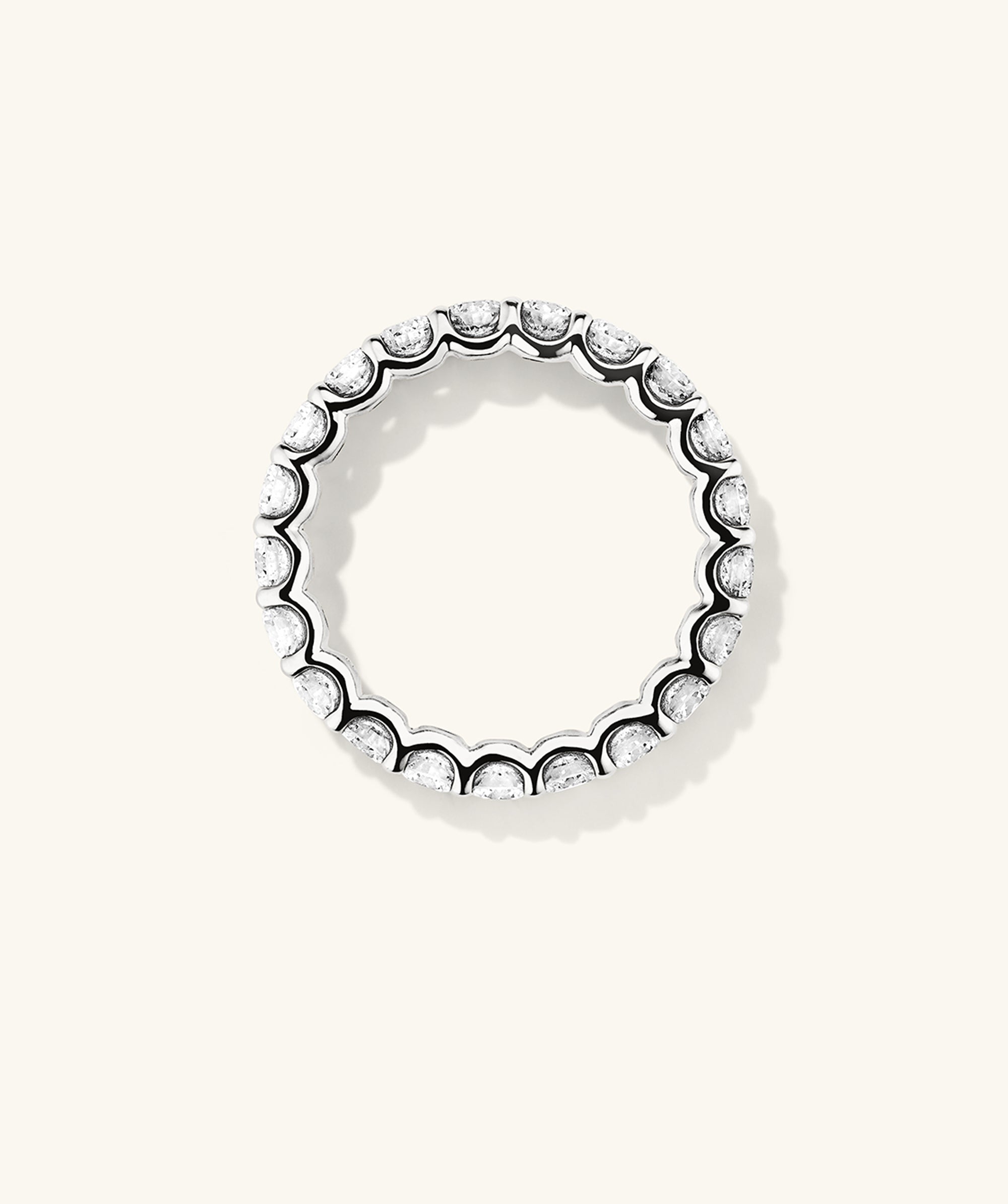 3mm Lab Grown Diamond Eternity Band: A close-up of a 14k solid gold ring adorned with lab-grown diamonds, showcasing its elegant and sparkling design.