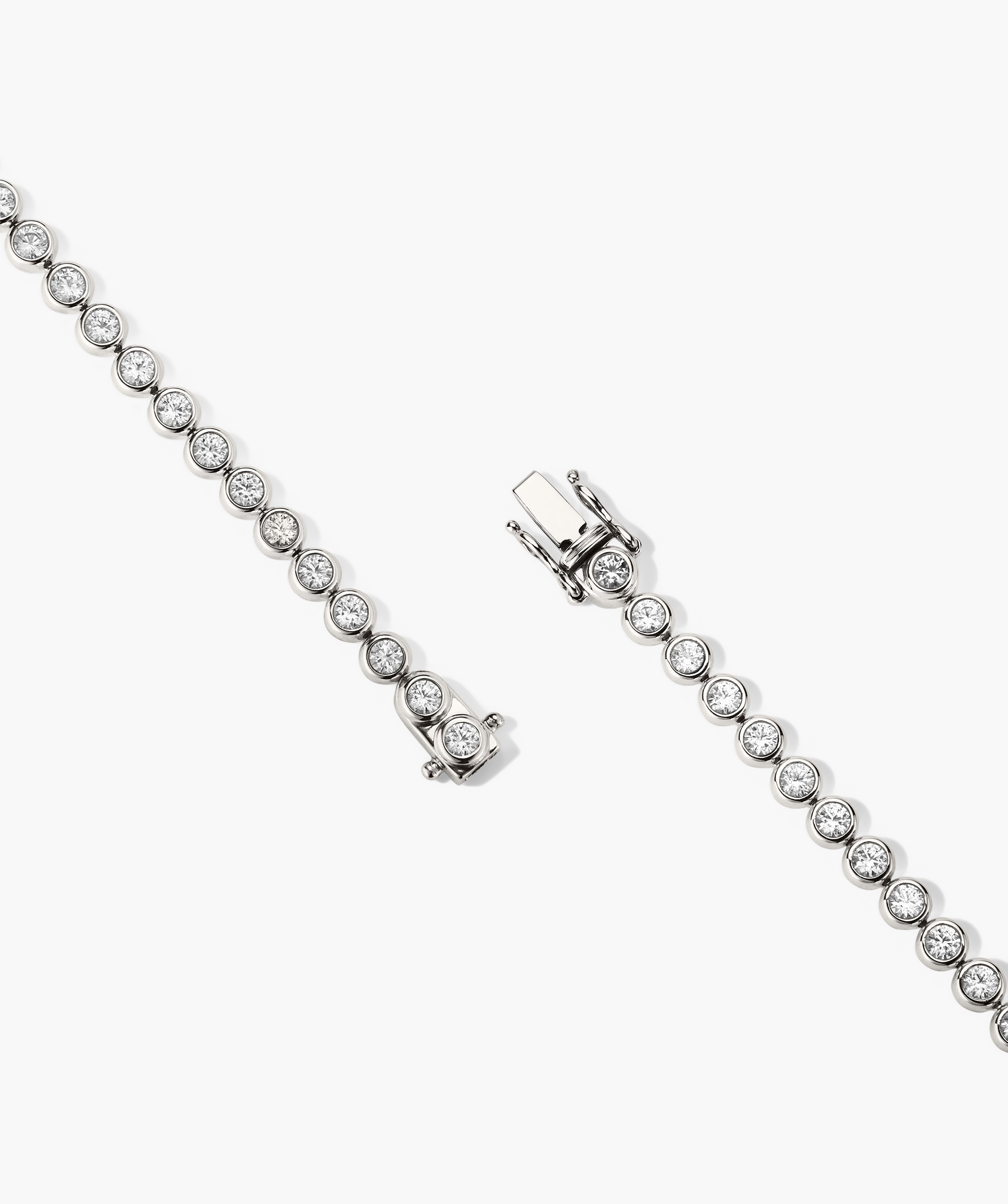 Zadie Bezel Lab Grown Sapphire Tennis Bracelet, featuring a pair of diamond-accented bracelets in bezel setting, showcasing intricate diamond details.