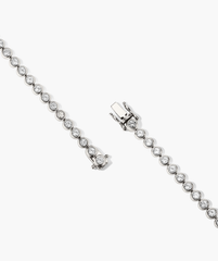 Zadie Bezel Lab Grown Sapphire Tennis Bracelet, featuring a pair of diamond-accented bracelets in bezel setting, showcasing intricate diamond details.