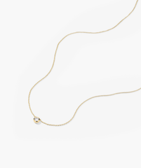 Large Diamond Necklace: A gold chain featuring a prominent diamond pendant, crafted as a timeless heirloom piece.