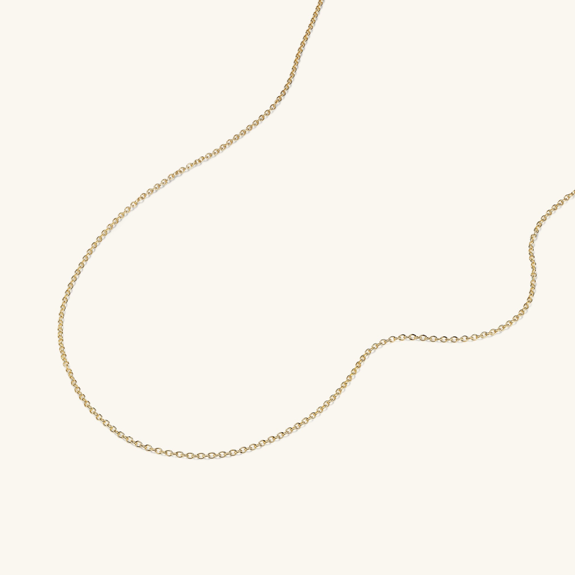 Cable Chain Necklace handcrafted in 14k solid yellow gold, displayed on a white background, emphasizing its timeless and versatile design.
