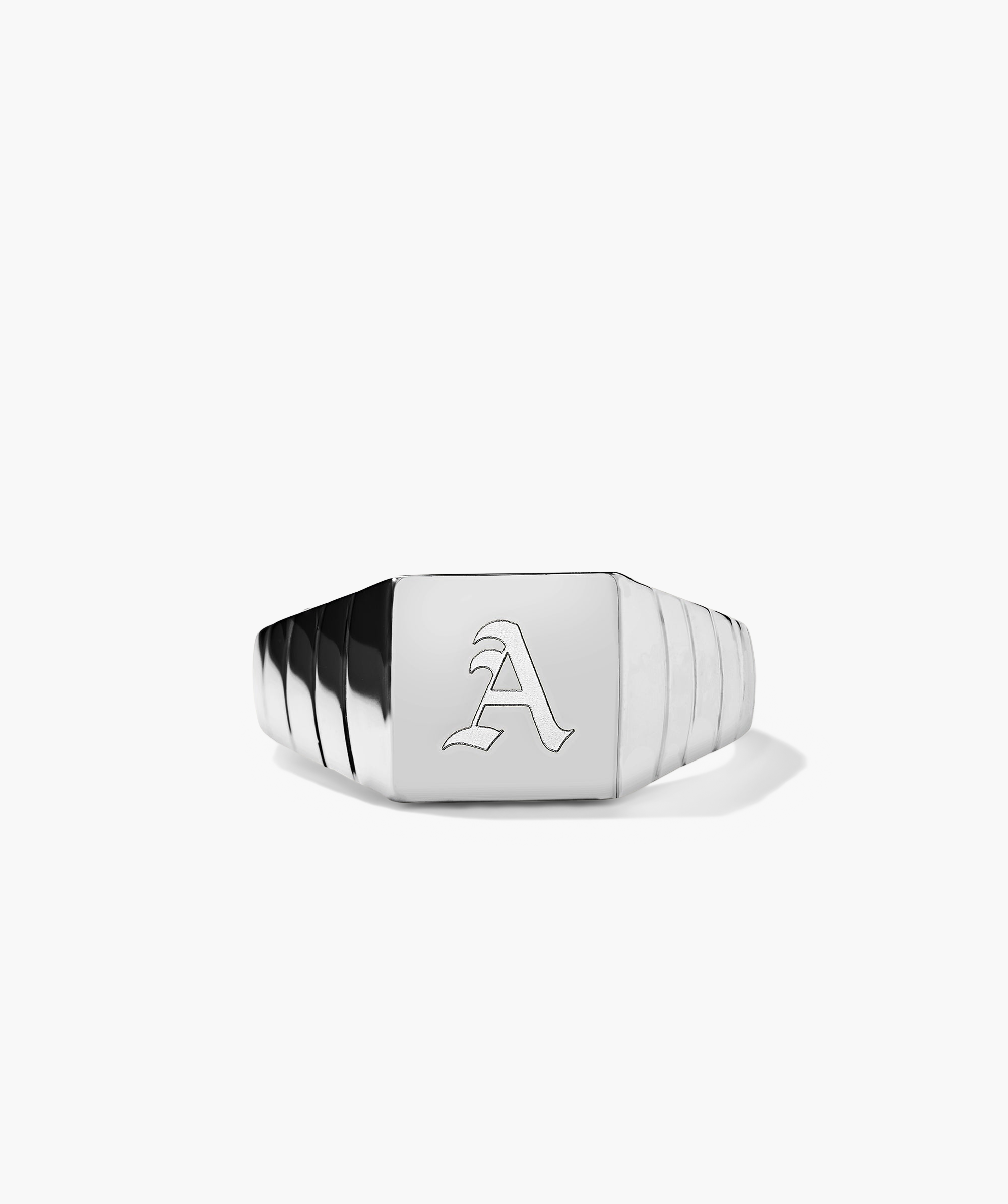 Square Signet Ring featuring a bold design with a letter engraved on the silver surface, perfect for adding to your ring stack.