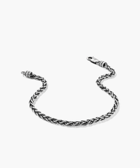 3.3mm Wheat Chain Bracelet: A close-up of an intricately-woven wheat chain bracelet with a clasp, handcrafted in oxidized sterling silver for a lived-in look.