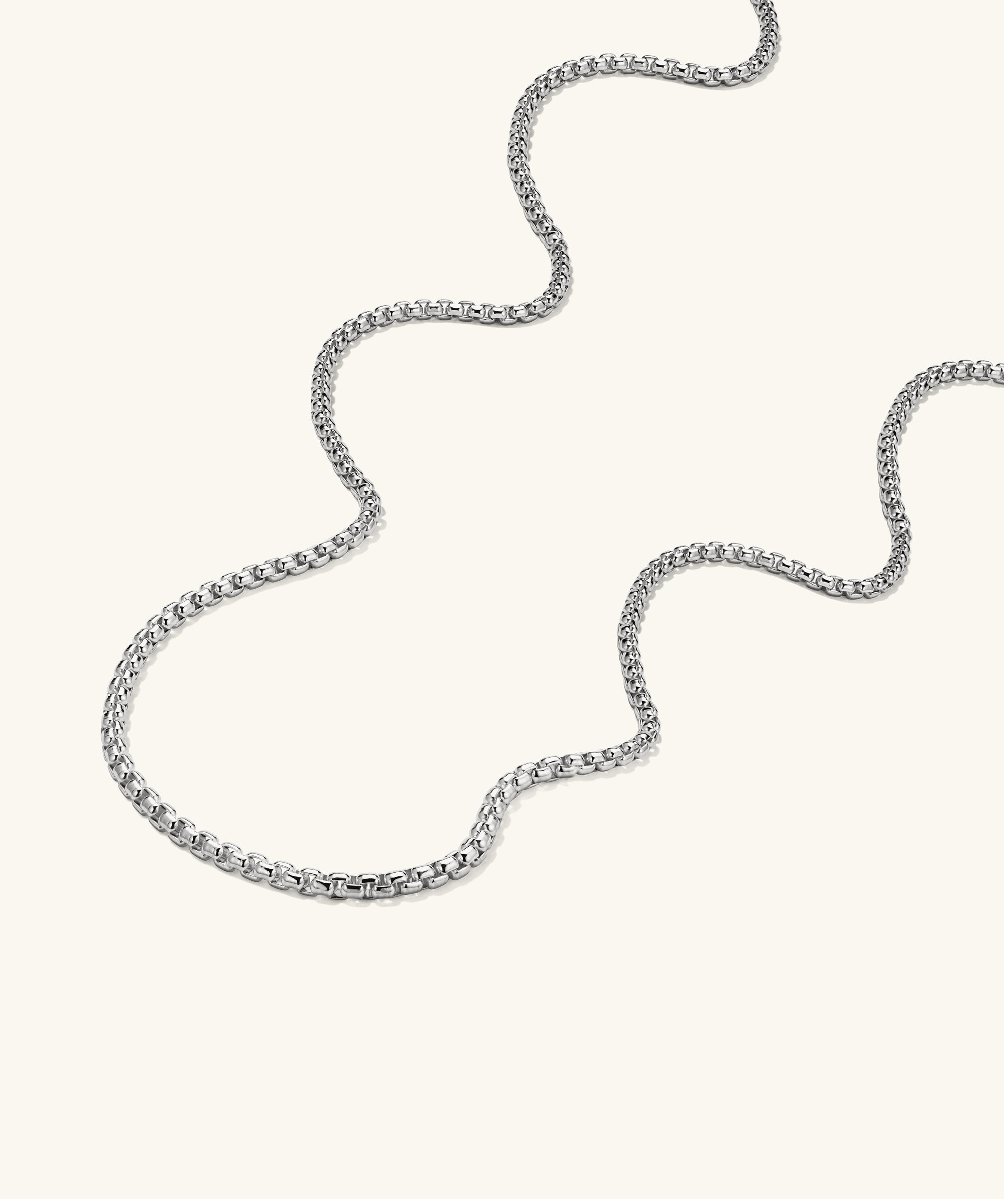 3.7mm Round Box Chain Necklace: a handcrafted sterling silver chain, elegantly simple, displayed on a white surface.