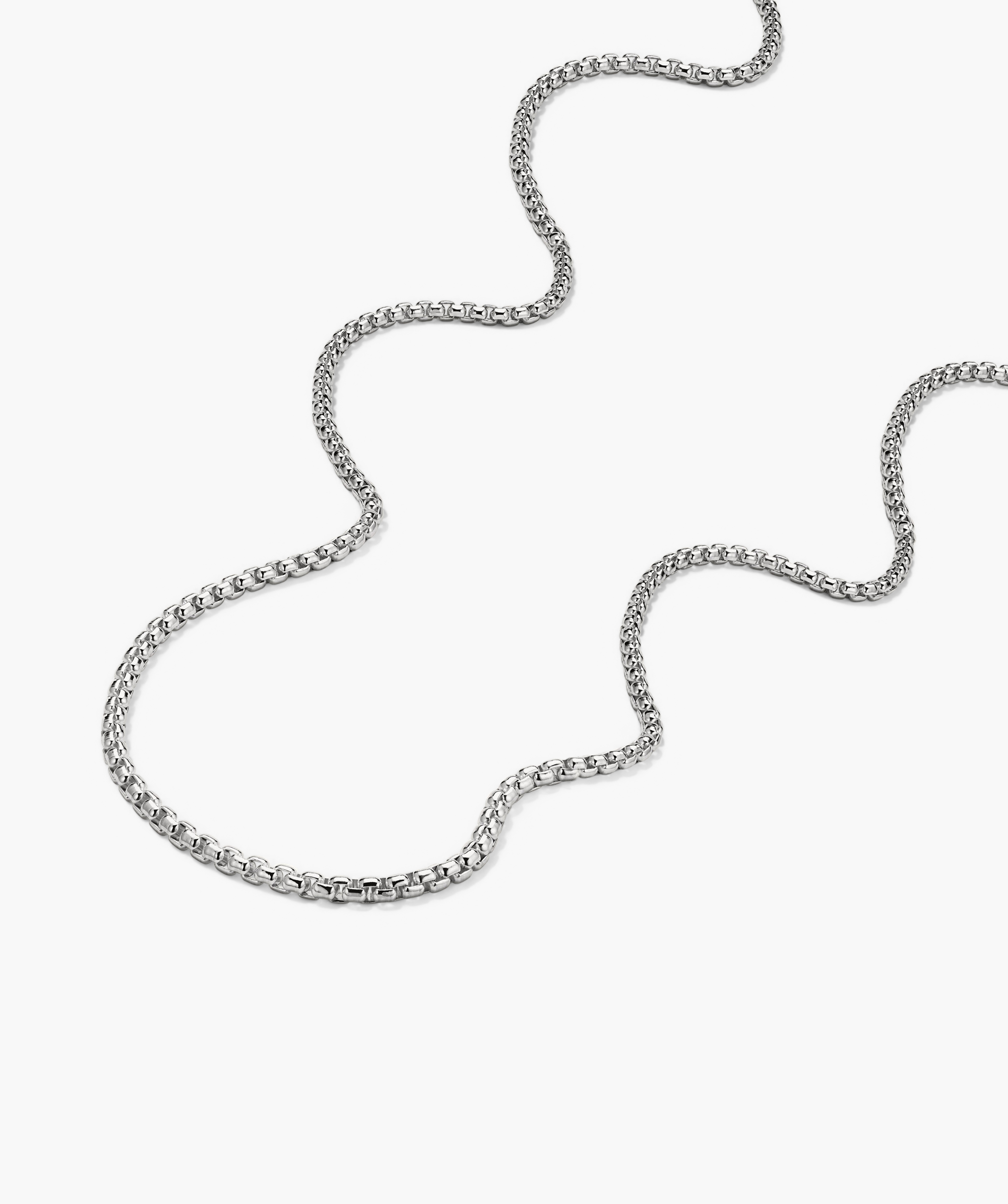 3.7mm Round Box Chain Necklace: a handcrafted sterling silver chain, elegantly simple, displayed on a white surface.