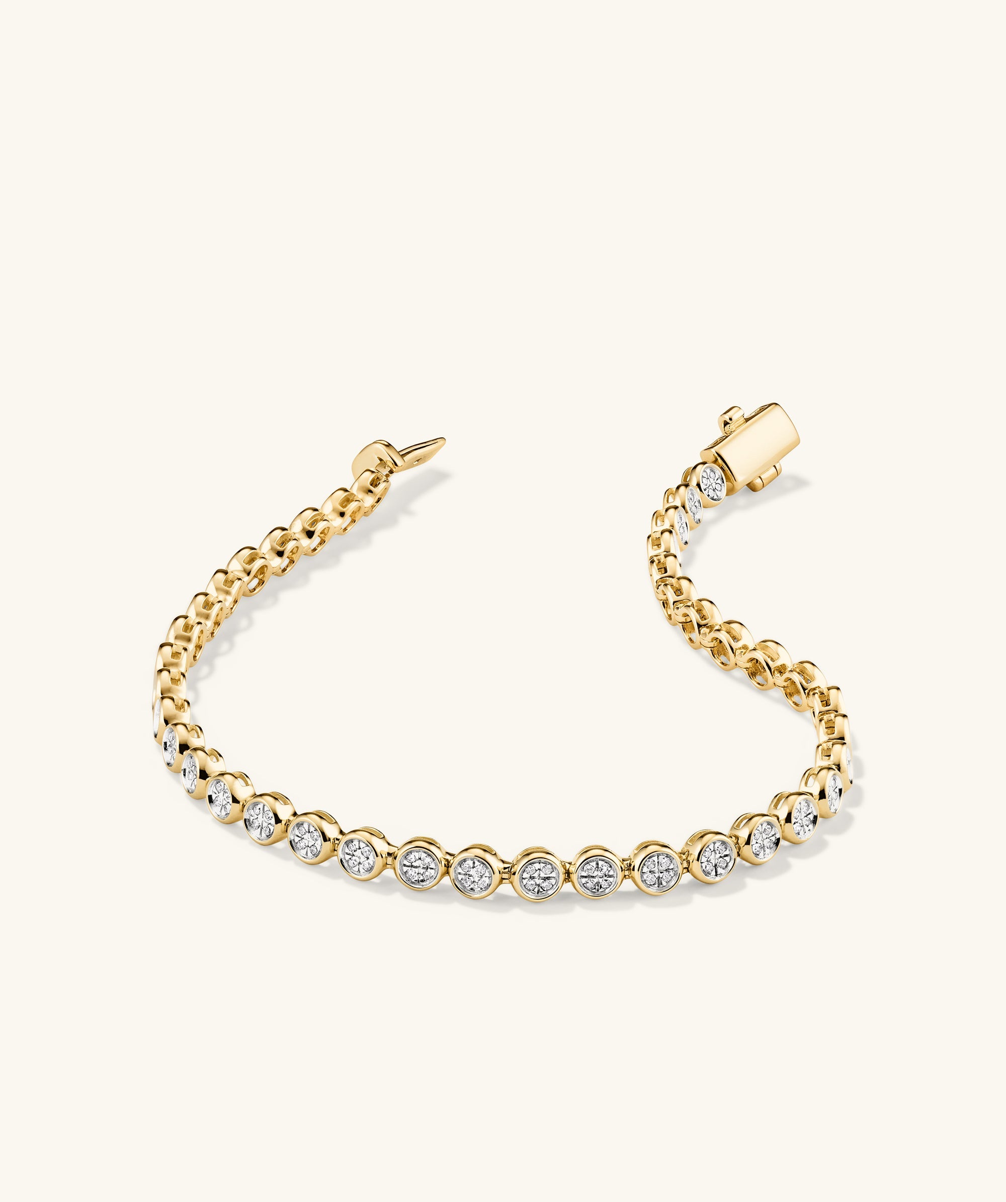 Micro-PavÃ© Diamond RiviÃ¨re Bracelet in 14k gold, featuring 176 knife edge bezel-set diamonds for a continuous shine, handcrafted by master jewelers.
