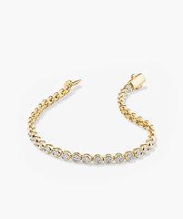 Micro-PavÃ© Diamond RiviÃ¨re Bracelet in 14k gold, featuring 176 knife edge bezel-set diamonds for a continuous shine, handcrafted by master jewelers.
