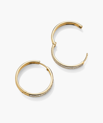 Bold PavÃ© Diamond Large Hoops: a pair of 14k solid gold hoop earrings adorned with responsibly sourced diamonds, designed to sparkle and attract compliments.