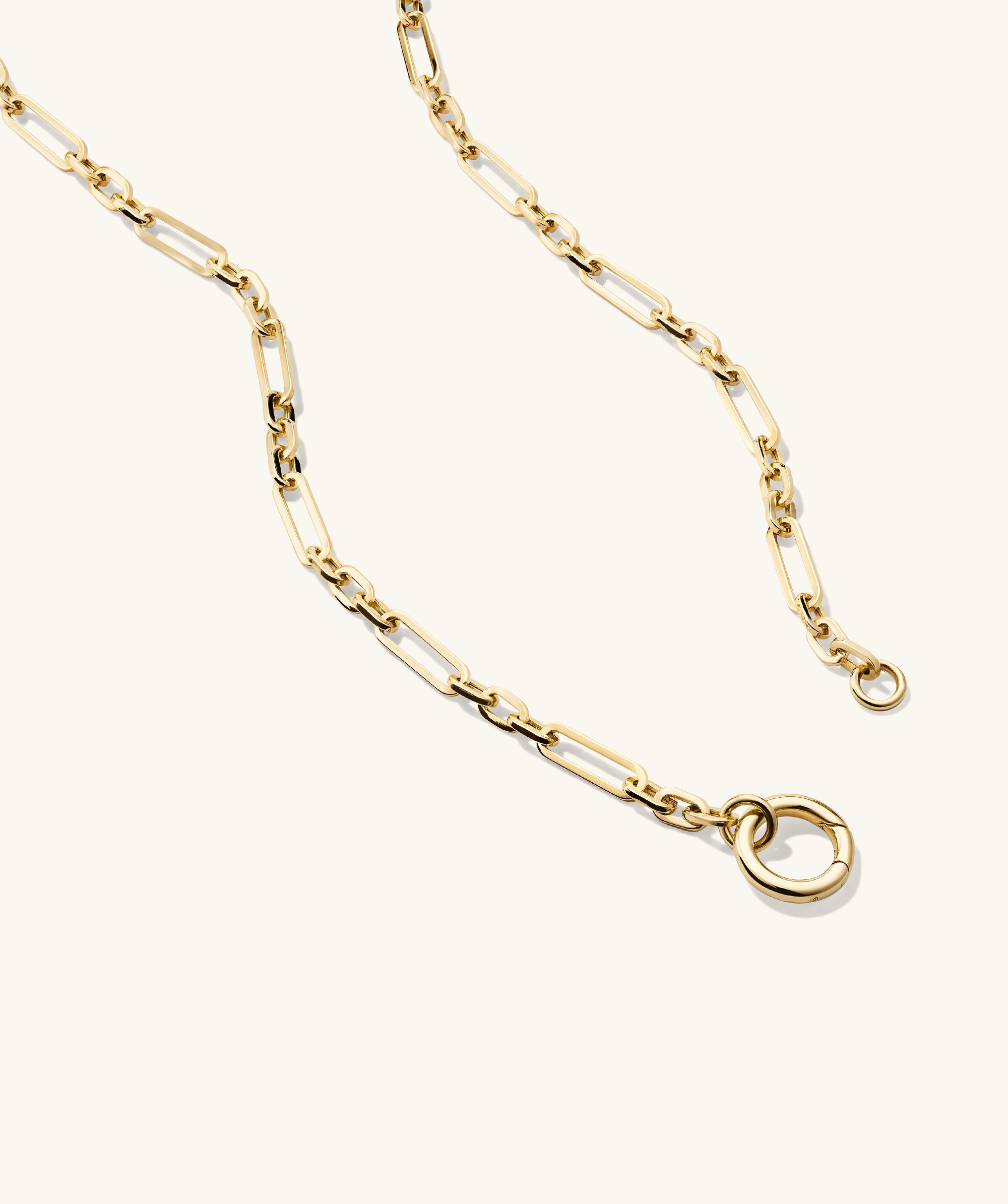 Triple Link Paperclip Chain Charm Necklace: A 14k gold handcrafted chain featuring interlinked paperclip-style links with a single ring charm.