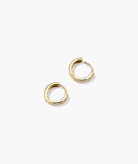 Bold PavÃ© Diamond Huggie Hoops: A pair of 14k solid gold hoop earrings featuring pavÃ©-set, responsibly sourced diamonds, handcrafted for a sparkling, elegant look.